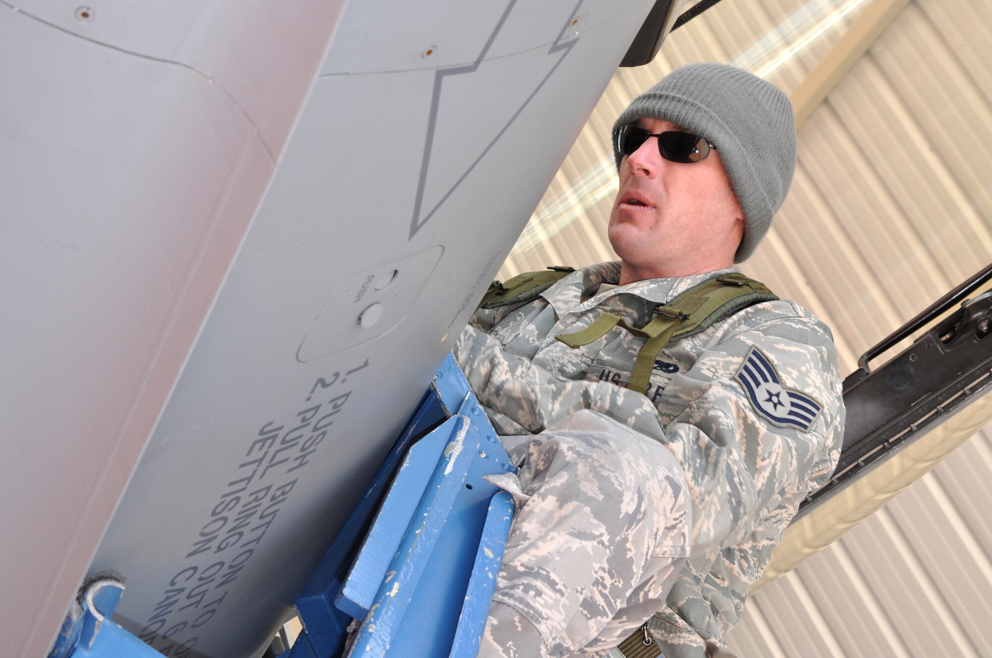 Staff Sgt. Taylor Myers inspects and "safes" the cockpit of an F-16C Fighting Falcon March 5 at Naval Air Station Fort Worth Joint Reserve Base, Texas, during a "surge" exercise held by the 301st Fighter Wing.  Sergeant Taylor is performing a "thru-flight" inspection on the aircraft, which he aims to have ready to fly again in two hours.  The 301st Maintenance Group produced 38 sorties in one day, which were flown by pilots from the 457th Fighter Squadron. (U.S. Air Force photo/Lt. Col. David Kurle)