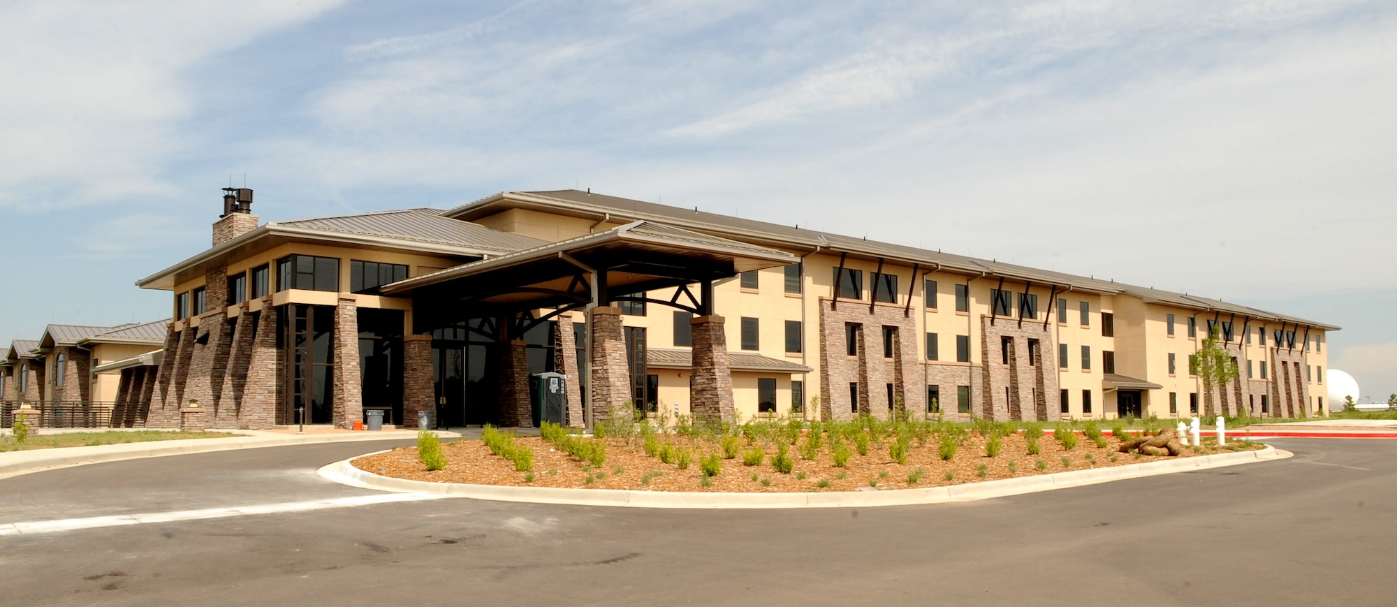 Buckely Air Force Base, Colo.- Due to a series of needed design corrections, though the building is standing, construction is not yet finished. Though structual delays have prevented occupancy, the Visitors Quarters/ Temporary Lodging Facility will open. ( U.S. Air Force photo by Airman 1st Class Marcy Glass )

