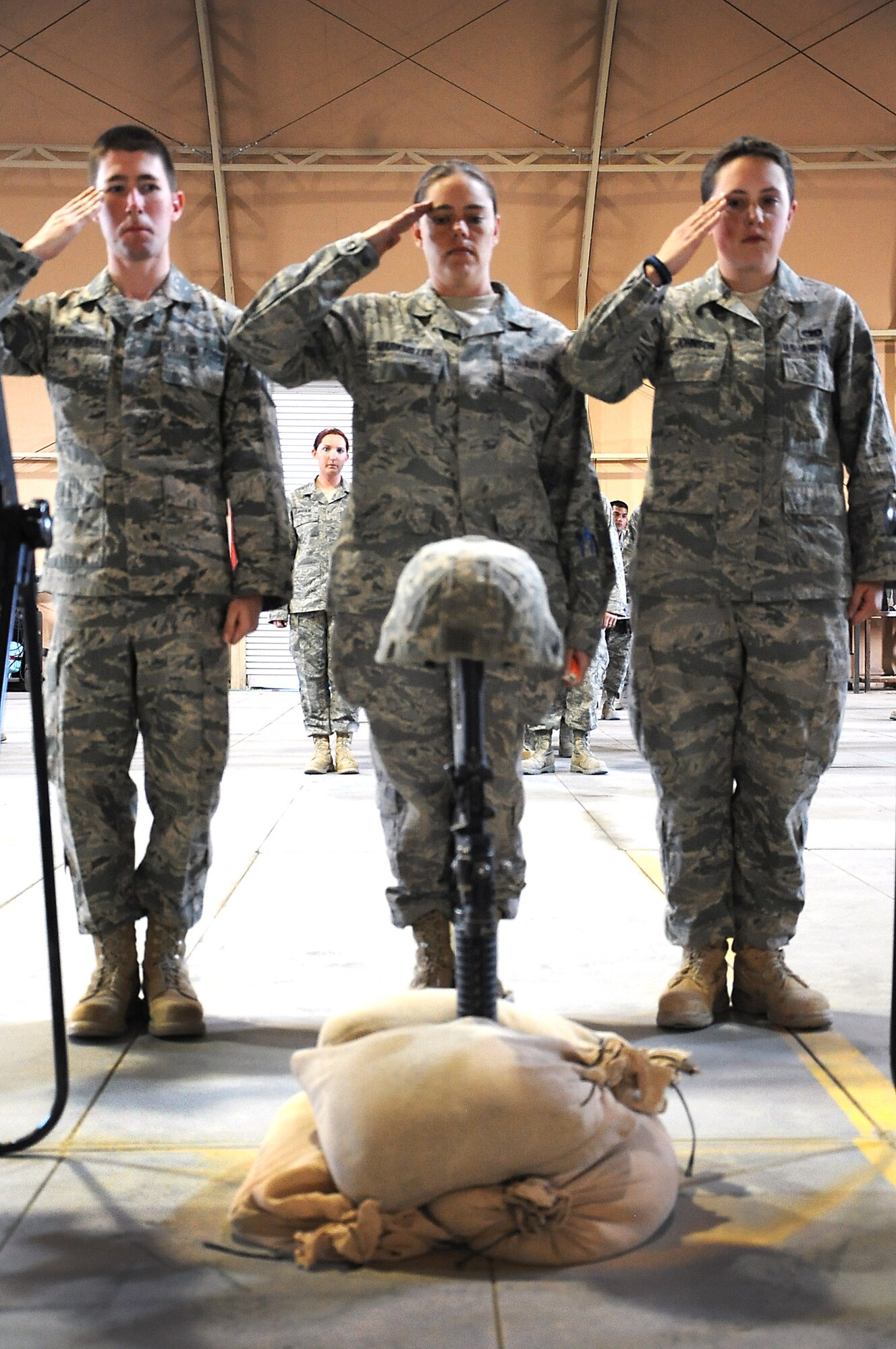 Airmen with the 386th Air Expeditionary Wing deployed to Southwest Asia from Ramstein Air Force Base, Germany, held a memorial service March 5, for Airman 1st Class Zachary Cuddeback who was killed March 2 at Terminal 2 of the Frankfurt (Germany) Airport. (U.S. Air Force photo by Senior Airman Cynthia Spalding)

