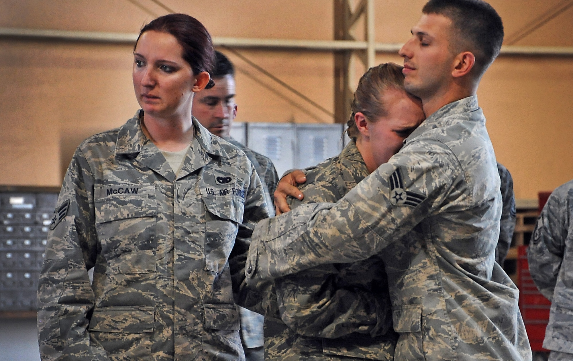 Airmen with the 386th Air Expeditionary Wing deployed to Southwest Asia from Ramstein Air Force Base, Germany, held a memorial service March 5, for Airman 1st Class Zachary Cuddeback who was killed March 2 at Terminal 2 of the Frankfurt (Germany) Airport. (U.S. Air Force photo by Senior Airman Cynthia Spalding)
