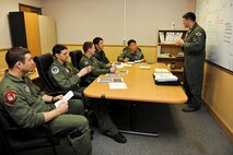 KUNSAN AIR BASE, Republic of Korea -- U.S. Air Force and ROK Air Force leaders exchange tactics and procedures for the betterment and safety of the peninsula here March 9. This knowledge exchange is part of an exercise called, "Buddy Wing", which is a combined fighter exchange program designed to improve interoperability between the U.S. Air Force and ROK Air Force fighter squadrons. (U.S. Air Force photo by Tech. Sgt. Jonathan Pomeroy)