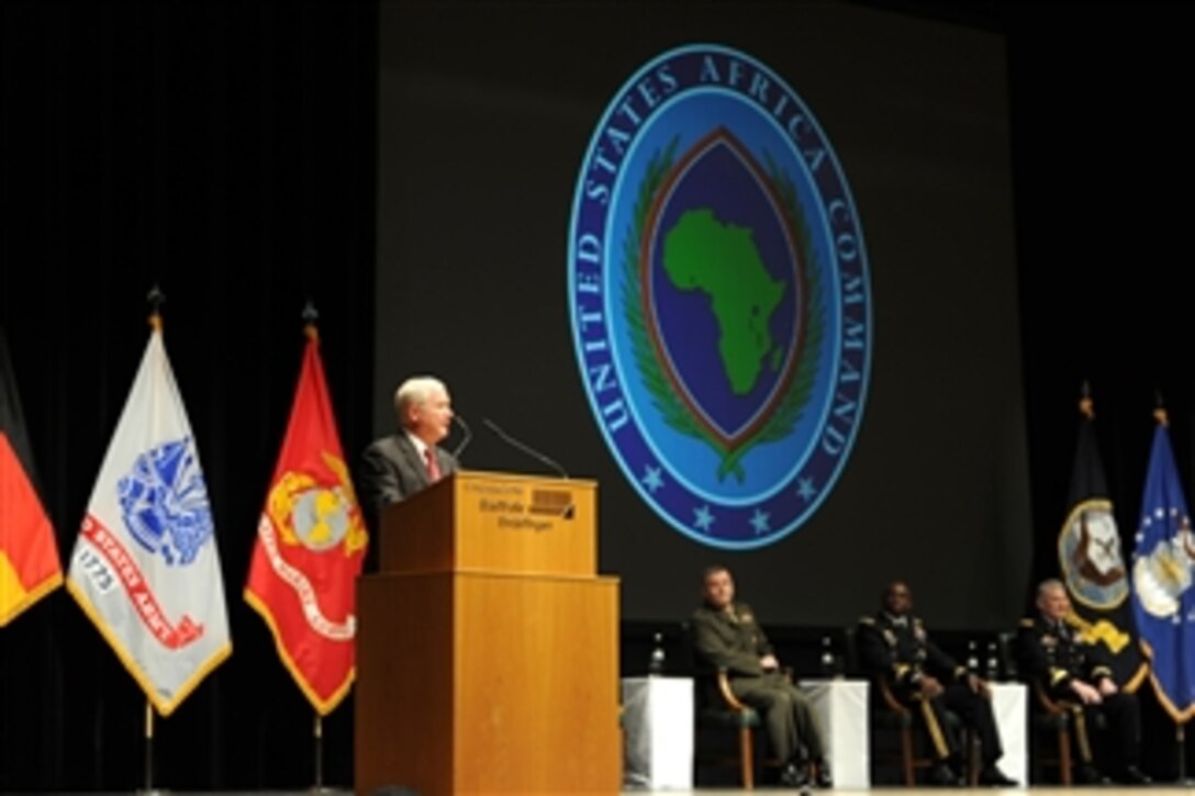 Secretary of Defense Robert M. Gates addresses the audience during the change of command ceremony between outgoing commander of U.S. Africa Command Army Gen. William Ward and incoming commander of US AFRICOM Army Gen. Carter Ham at Sindelfingen Stadthalle City Hall in Stuttgart, Germany, on March 9, 2011.  