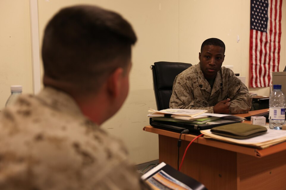 Sgt Quinton King, a Chicago native, mentors one of his Marines in the administration section. The adjutant non-commissioned officer in charge for the section, , 2nd Marine Division (Forward), devotes his time to serving others.