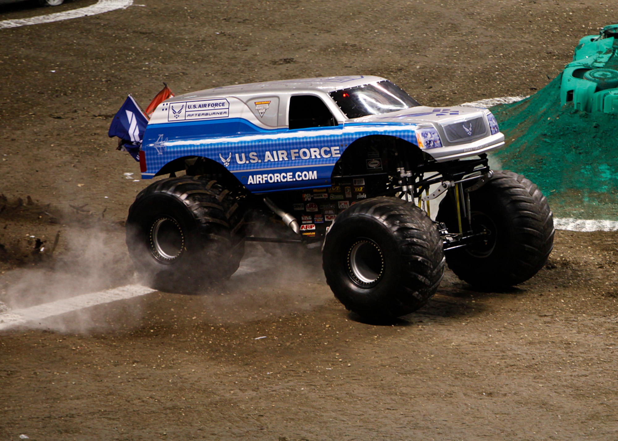 The Air Force Monster truck speeds across the finish line at San Antonio’s Monster Jam January 15.  Making a presence at high-visibility events such as Monster Jam is important for recruiting and emphasizes the speed, power, precision and teamwork that is common to both Monster Jam and the Air Force.  (U.S. Air Force photo by Tech. Sgt. Jeff Wolfe)