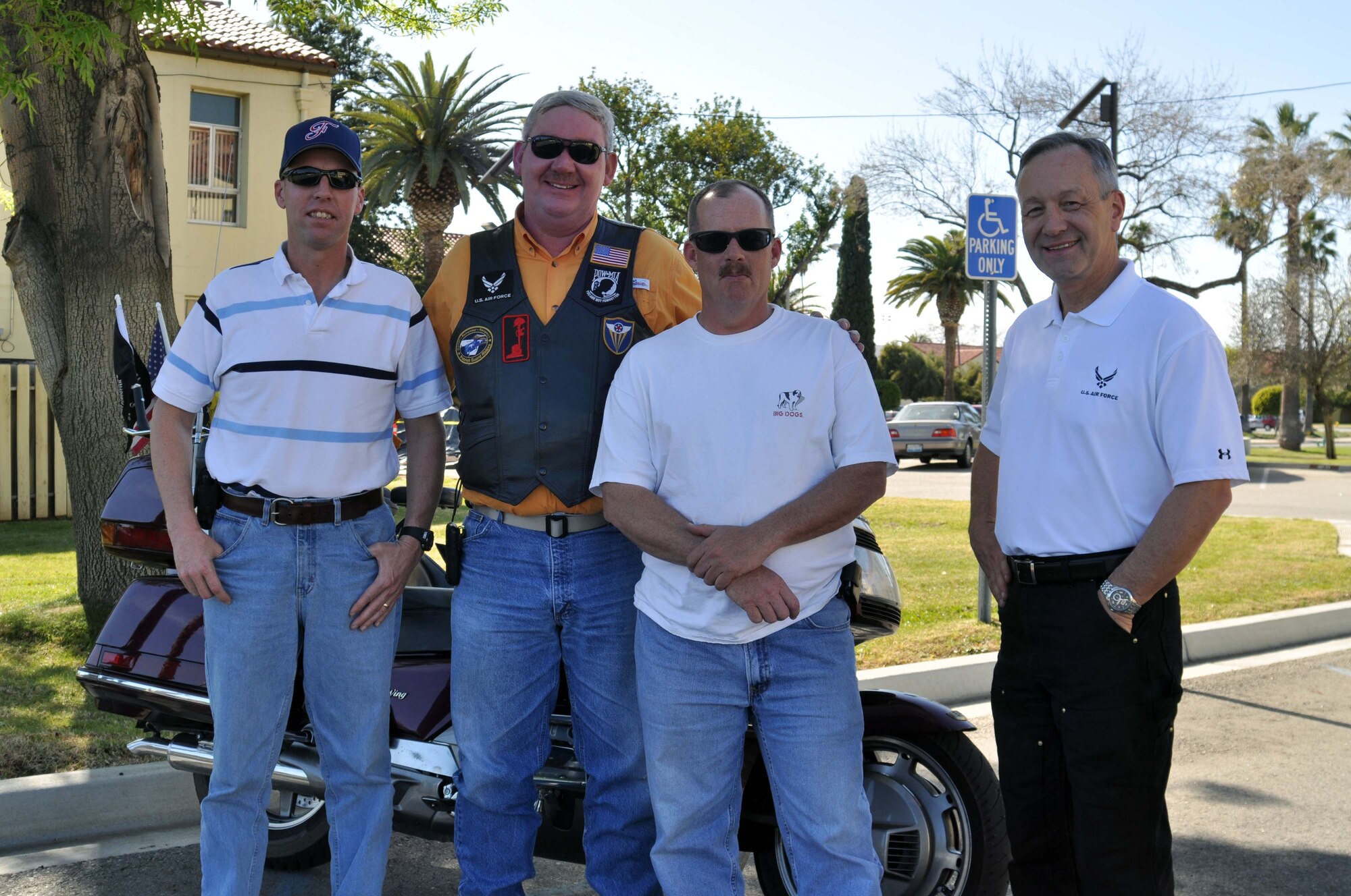 Senior Master Sgt. Ron Bolten, Chief Master Sgt. Bob Wright and Chief Master Sgt. Dennis Pearson pose with Maj. Gen. Eric W. Crabtree, commander, 4th Air Force, following a farewell motorcycle ride at March Air Reserve Base, Calif., March 9, 2011.  Members of 4th Air Force organized the ride as a way to say goodbye to General Crabtree, who will be taking a new assignment at the Defense Threat Reduction Agency, Ft. Belvoir, Va. 