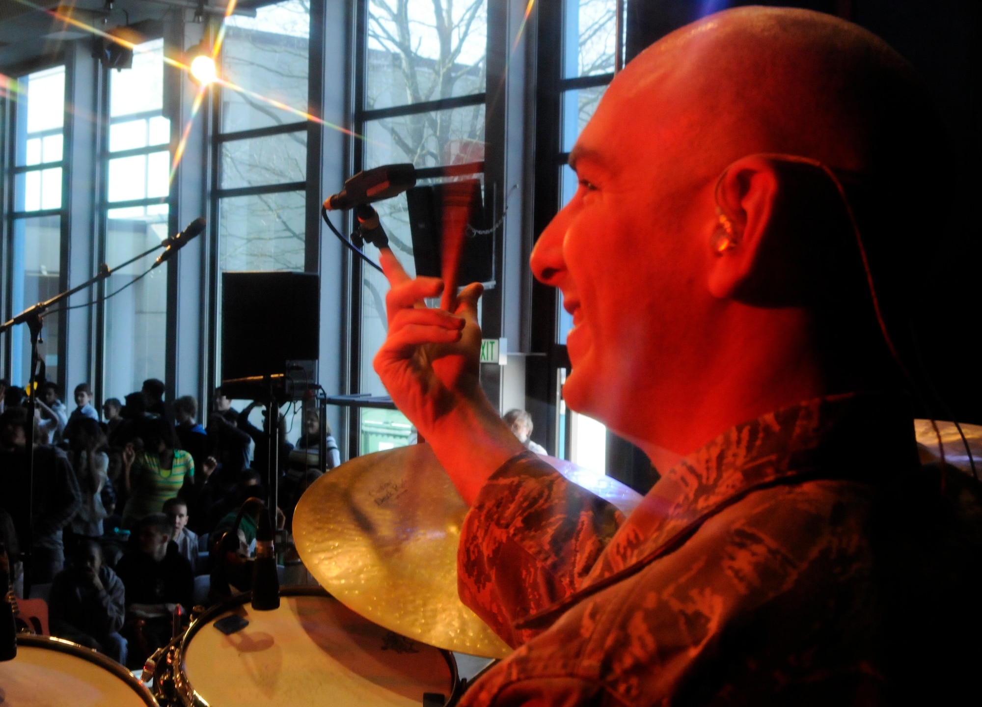 ANSBACH, Germany – Staff Sgt. Jon Friedman, U.S. Air Forces in Europe Band Touch ‘n Go percussionist, performs for Ansbach Middle and High School students on U.S. Army Garrison Ansbach, Germany, during a performance March 9. Touch ‘n Go performed before a packed gymnasium of students and teachers at the school as part of a Music in Our Schools tour throughout Bavaria. (U.S. Air Force photo/Staff Sgt. Kali L. Gradishar)