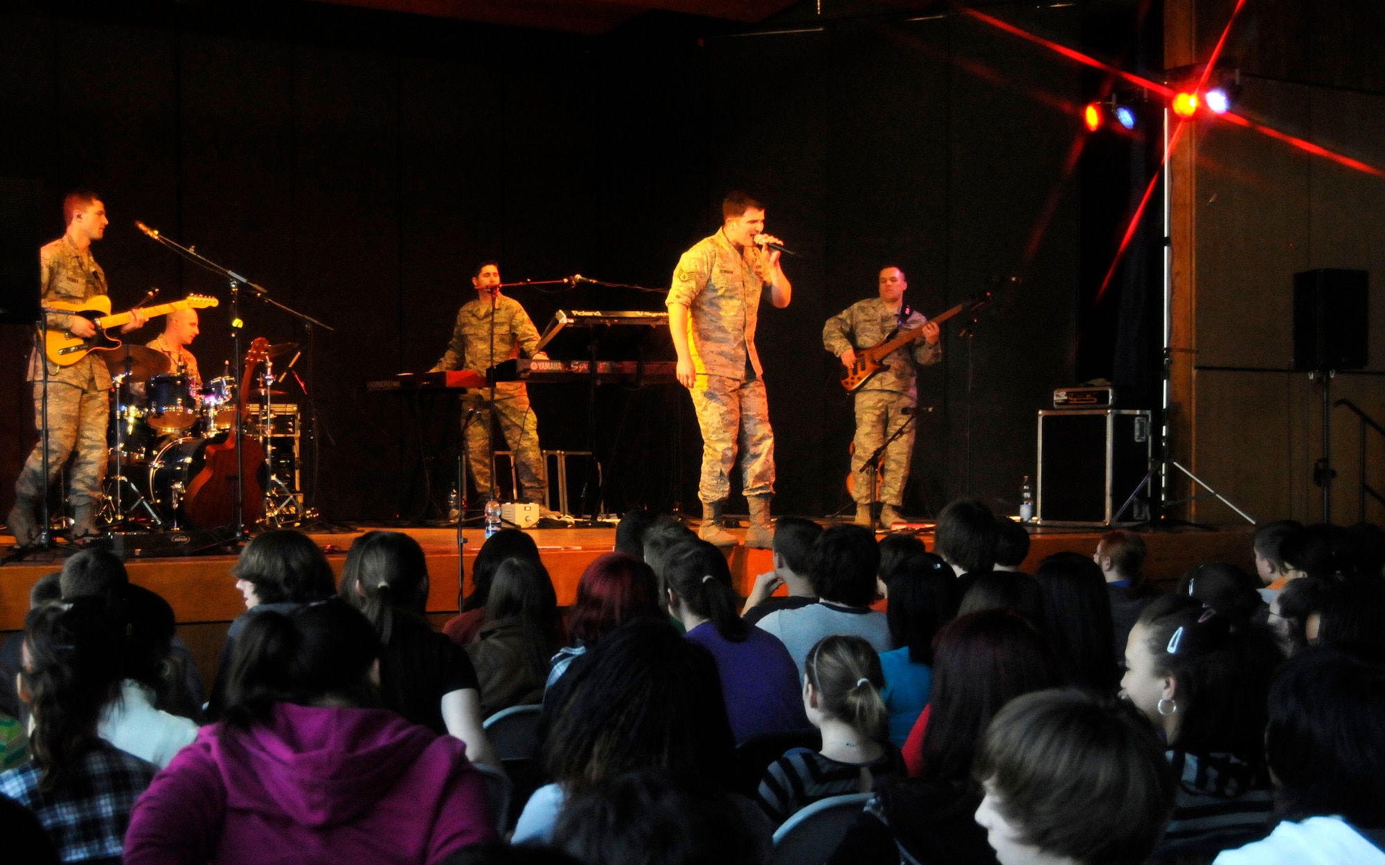 ANSBACH, Germany – The U.S. Air Forces in Europe Band Touch ‘n Go performs for a gymnasium packed with Ansbach Middle and High School students and teachers on U.S. Army Garrison Ansbach, Germany, March 9. Touch ‘n Go performed before a packed gymnasium of students and teachers at the school as part of a Music in Our Schools tour throughout Bavaria. (U.S. Air Force photo/Staff Sgt. Kali L. Gradishar)
