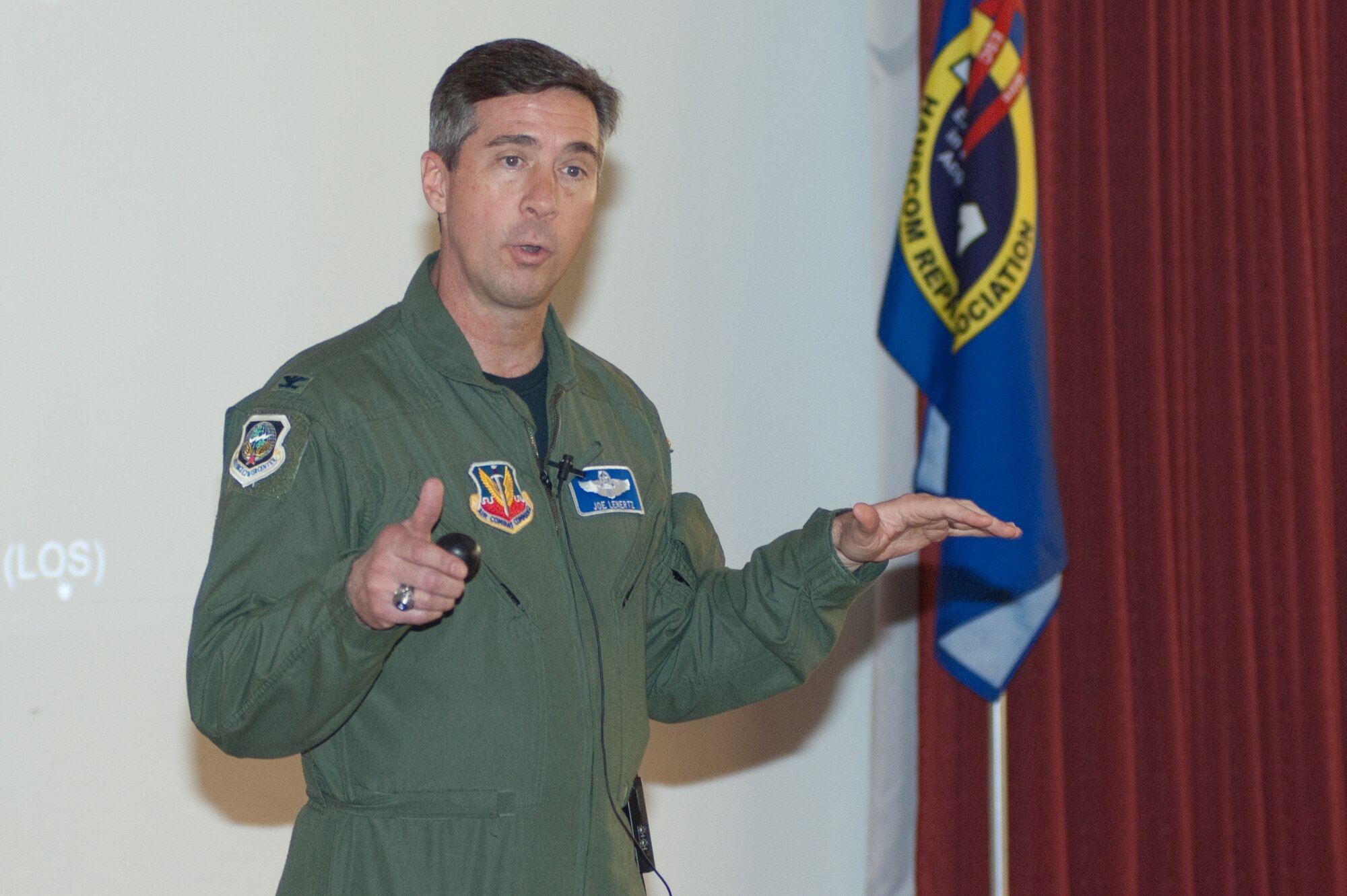 Col. Joe Lenertz, chief of the Tactical Data Links Enterprise Division at the Air Force Command and Control Integration Center, Langley AFB, Va., discusses the Joint Aerial Layer Network with Hanscom Representatives Association members at the Minuteman Club March 8.  (U.S. Air Force photo by Rick Berry)  


