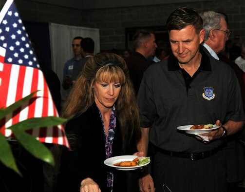 Maj. Gen. Stephen Hoog, 9th Air Force commander, gets a bite to eat with his wife Cynthia after the medallion ceremony for the Outstanding Performers of the Year held at the James H. Rainwater Conference Center in Valdosta, Ga., March 9. General Hoog presented each nominee with a medallion during the ceremony and socialized with Airmen from the 9th AF after the ceremony. (U.S. Air Force photo/Airman 1st Class Benjamin Wiseman)(RELEASED)