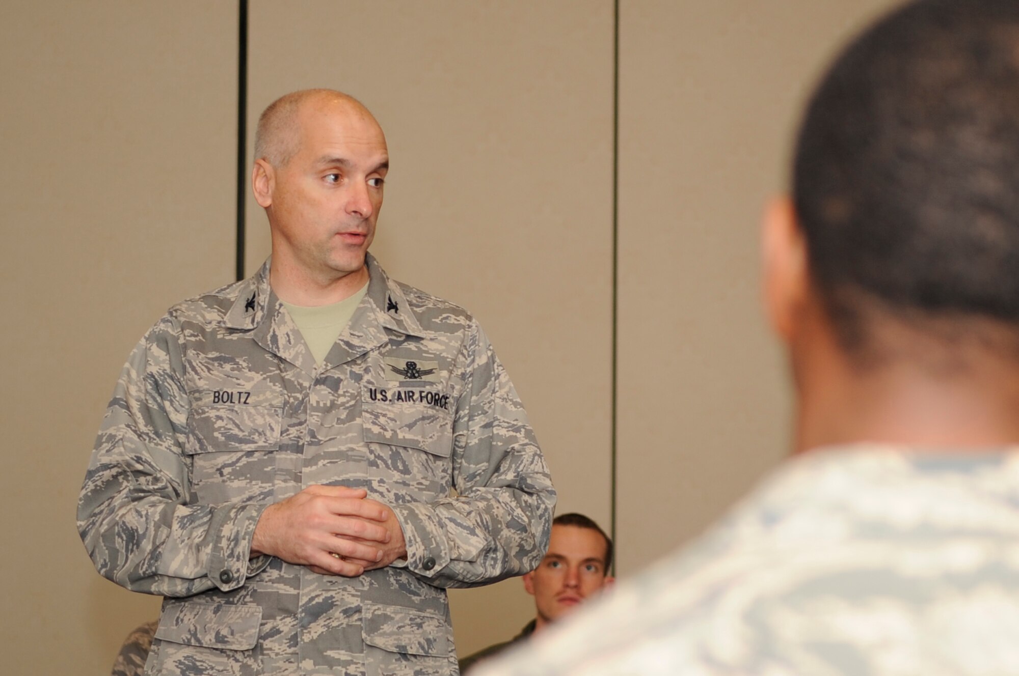 VANDENBERG AIR FORCE BASE, Calif. – Col. Richard Boltz, the 30th Space Wing commander, commends Airmen at the Air Force Assistance Fund Kick off breakfast for supporting the campaign at the Pacific Coast Club here Thursday, March 10, 2011. The AFAF is a program that supports Airmen and their families who are in need of emergency financial assistance. (U.S. Air Force photo/Senior Airman Lael Huss)