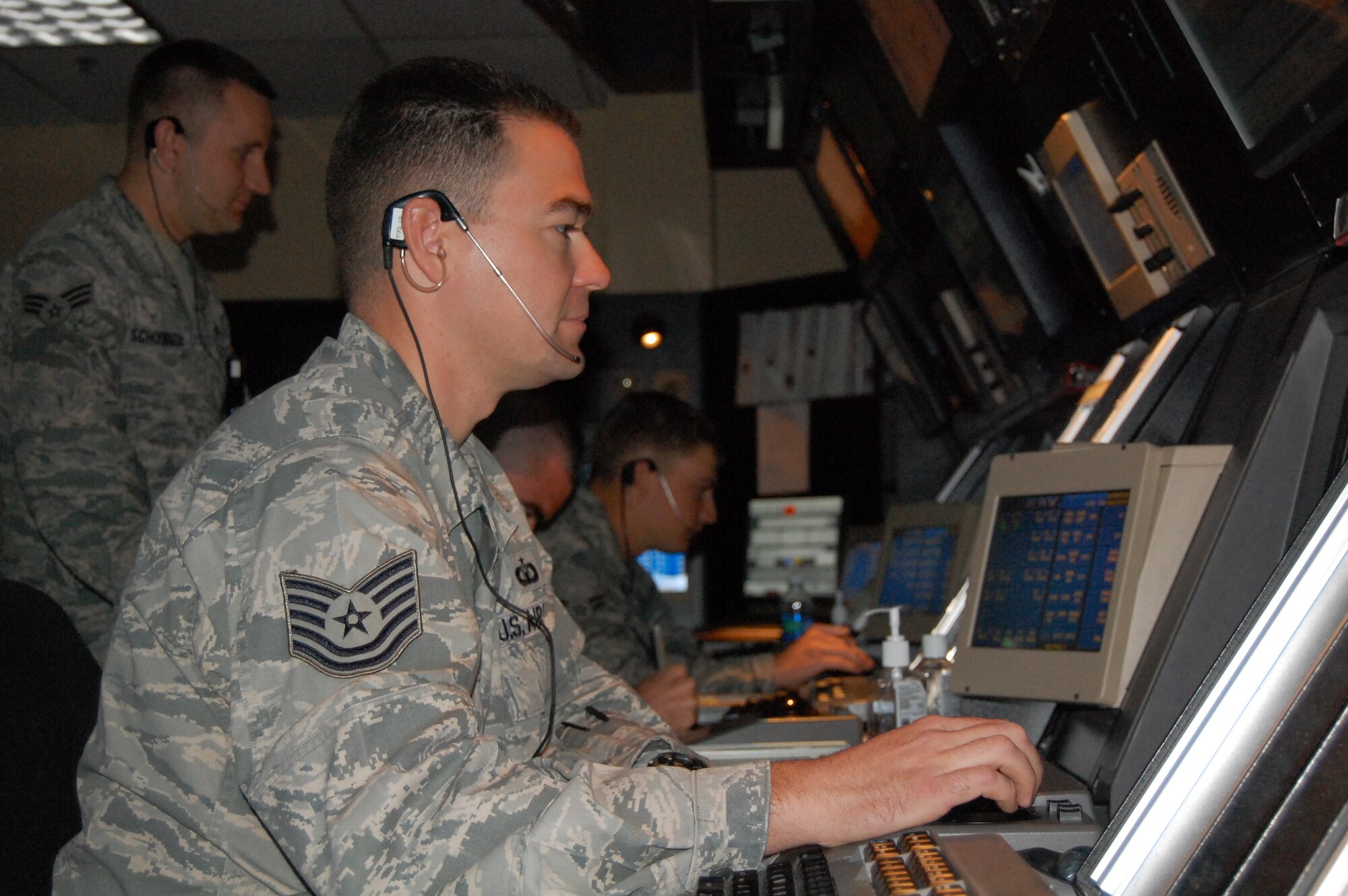 LAUGHLIN AIR FORCE BASE, Texas- Technical Sgt. Jason Russi monitors air traffic in Laughlin’s pattern.  Sergeant Russi was one of six enlisted members across the Air Force chosen for the Enlisted-to-AFIT program.  (U.S. Air Force photo by Master Sgt. Peter Borys)