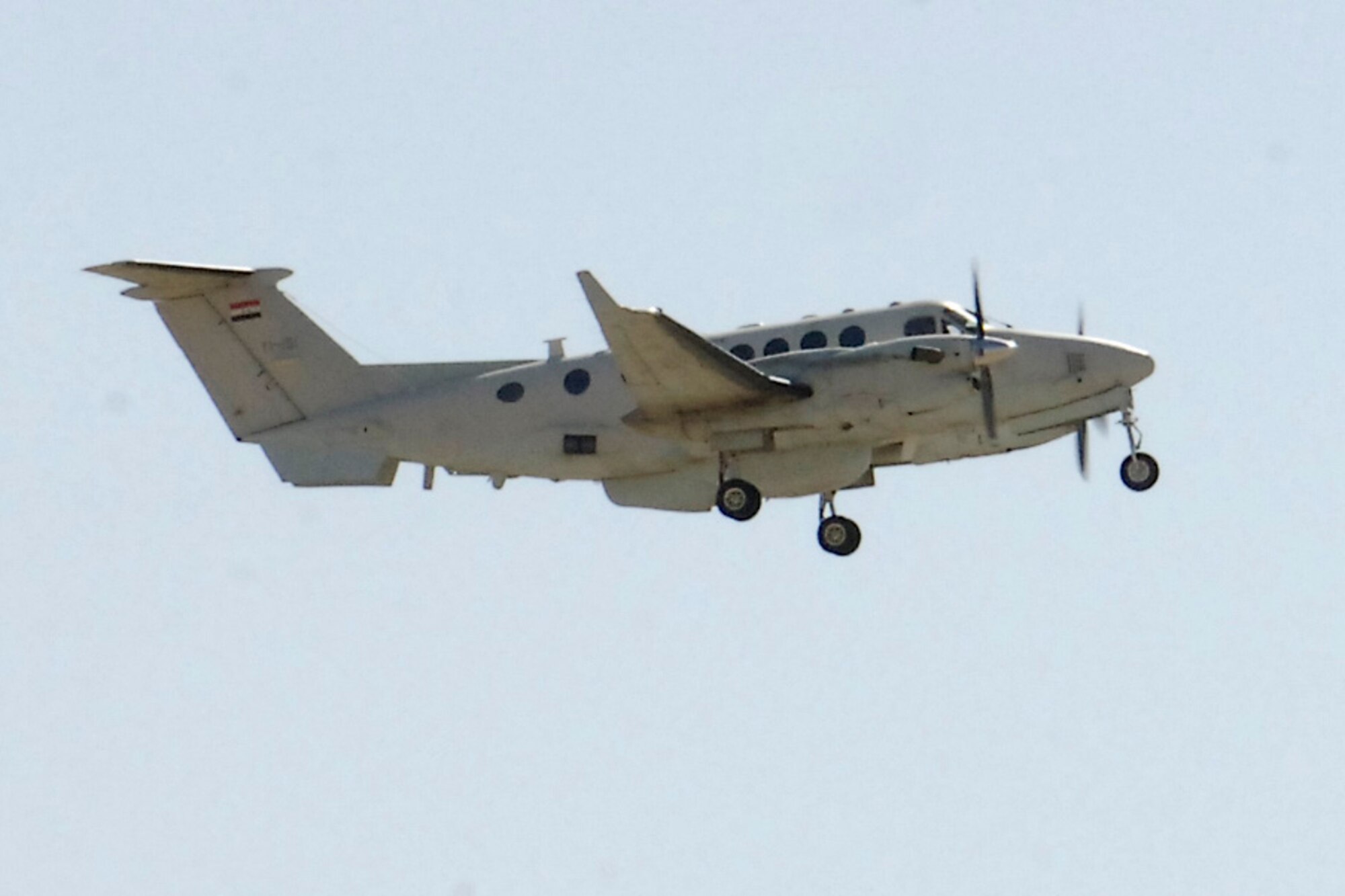 BASRAH, Iraq -- An Iraqi King Air 350 with a U.S. advisor and Iraqi pilot at the controls departs from Basrah International Airport March 3.  The King Air 350 pilot flew with advisors from the Iraq Training and Advisory Mission-Air as part of the training program started in 2008. (U.S. Air Force photo by Tech. Sgt. Randy Redman)