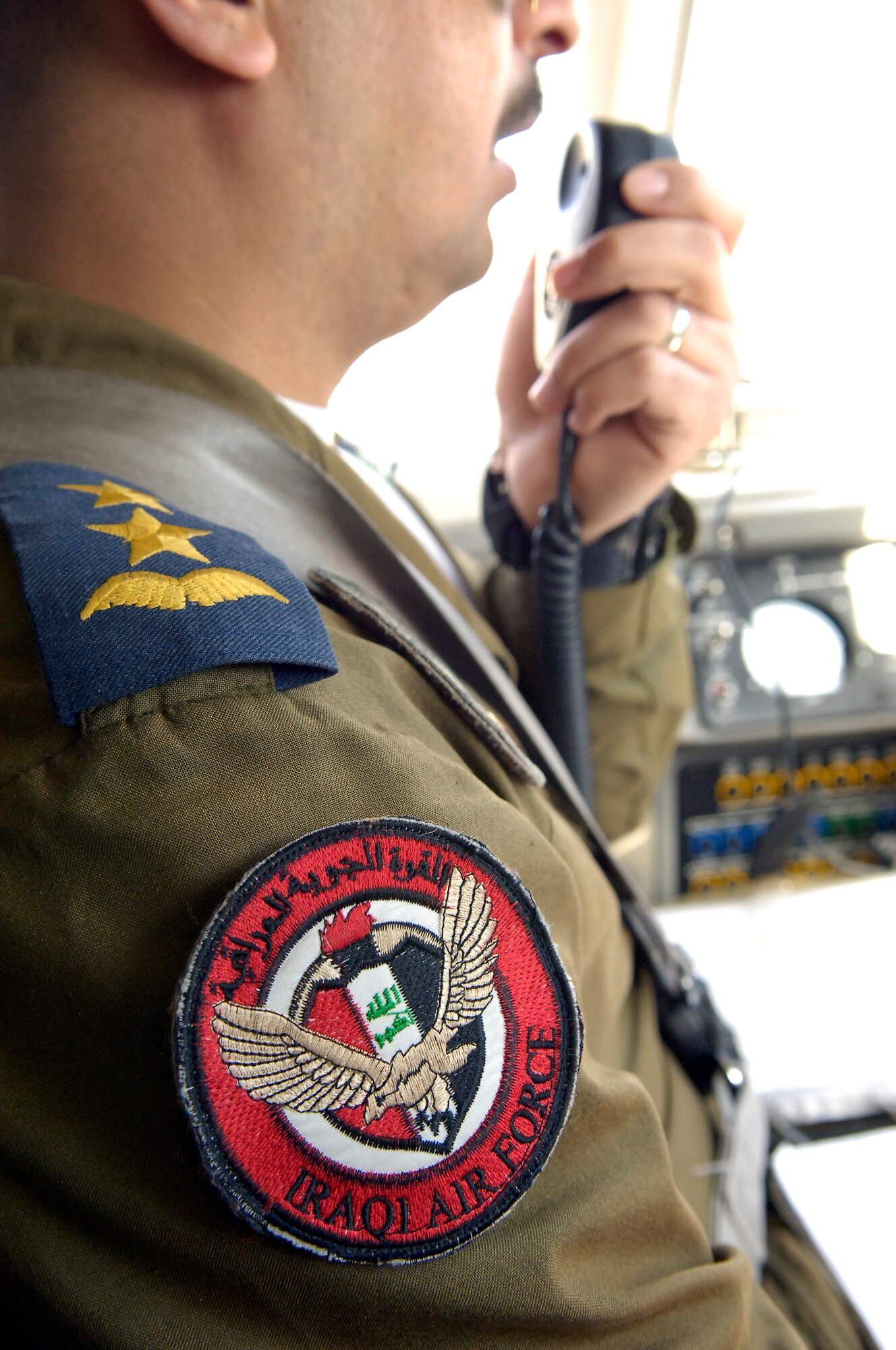 BAGHDAD -- An Iraqi pilot with Squadron 87 at New Al-Muthana Air Base calls the control tower for radio confirmation as part of his pre-flight preparation before takeoff on a mission March 3.  The King Air 350 pilot flew with advisors from the Iraq Training and Advisory Mission-Air as part of the training program started in 2008. (U.S. Air Force photo by Tech. Sgt. Randy Redman)