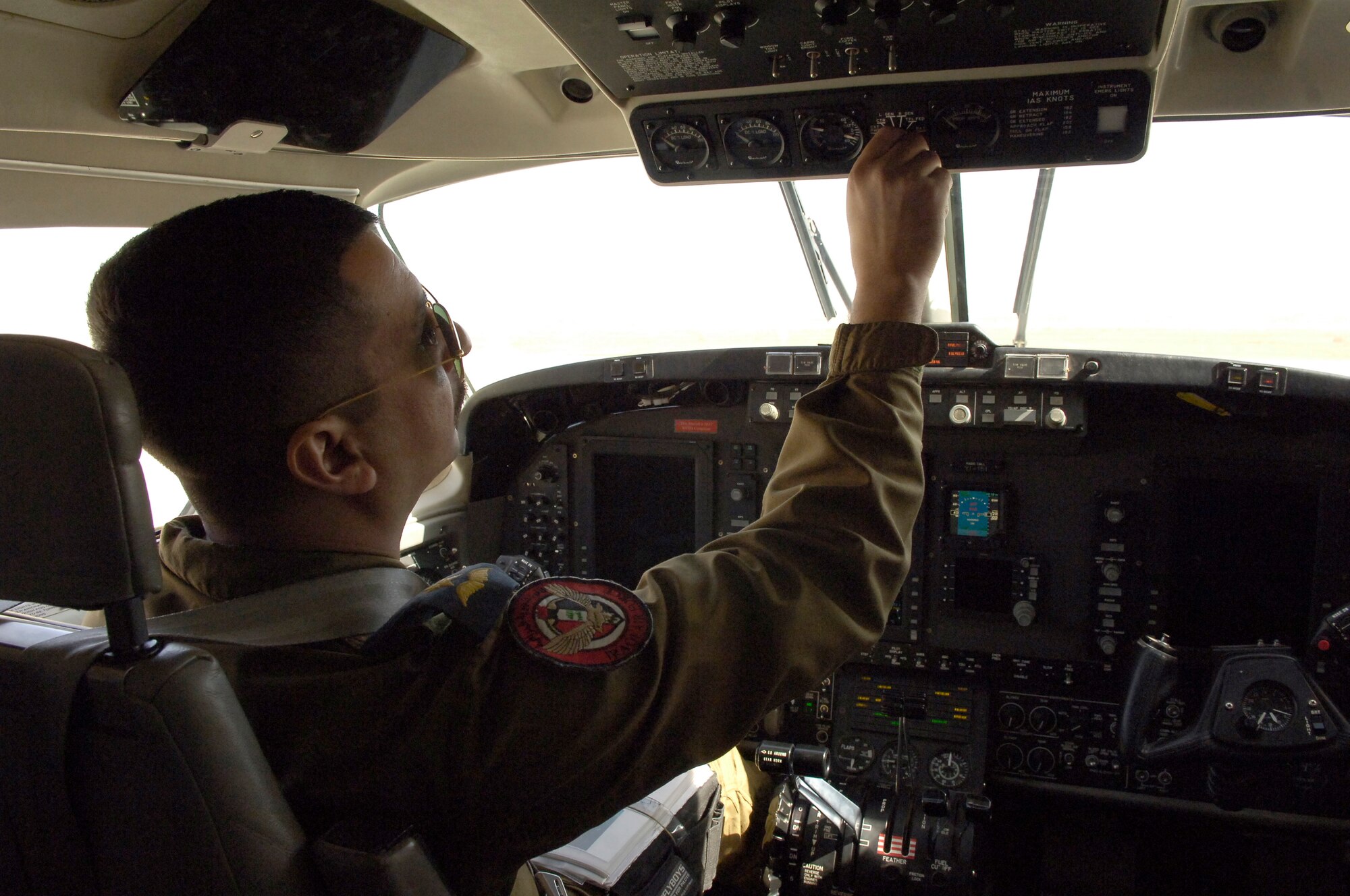 BAGHDAD -- An Iraqi pilot with Squadron 87 at New Al-Muthana Air Base goes through his pre-flight checks before takeoff on a mission here March 3.  The King Air 350 pilot flew with advisors from the Iraq Training and Advisory Mission-Air as part of the training program started in 2008. (U.S. Air Force photo by Tech. Sgt. Randy Redman)