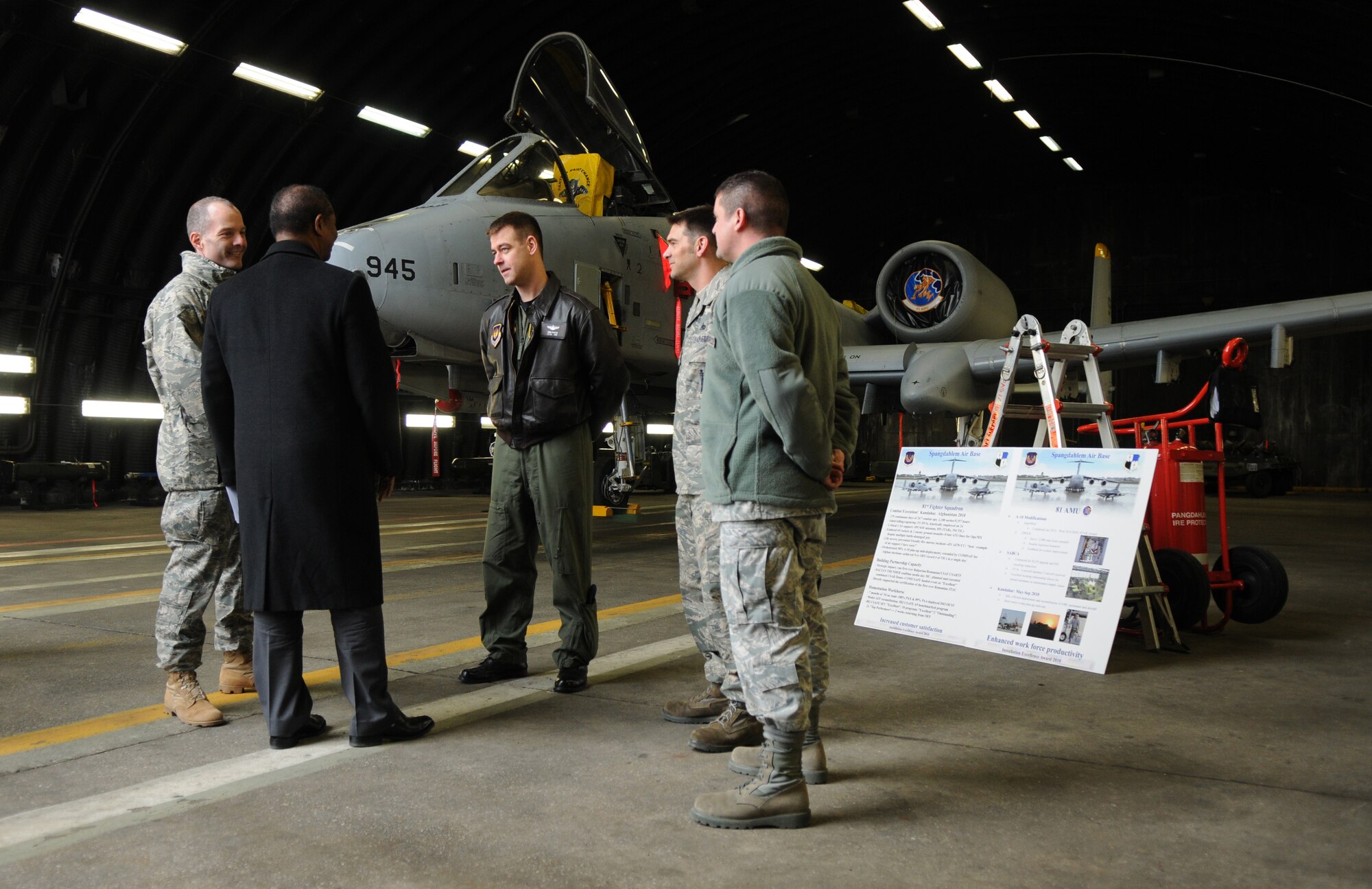 SPANGDAHLEM AIR BASE, Germany – Col. Jackson Fox, left, 52nd Operations Group commander, explains the 81st Fighter Squadron’s mission and what the squadron accomplished while deployed in support of Operation Enduring Freedom to Robert L. Gordon III, deputy assistant secretary of defense for military community and family policy, during Mr. Gordon’s visit here March 9. Mr. Gordon visited the 52nd Fighter Wing to better understand programs available to family members and community programs on base. (U.S. Air Force photo/Senior Airman Nathanael Callon)