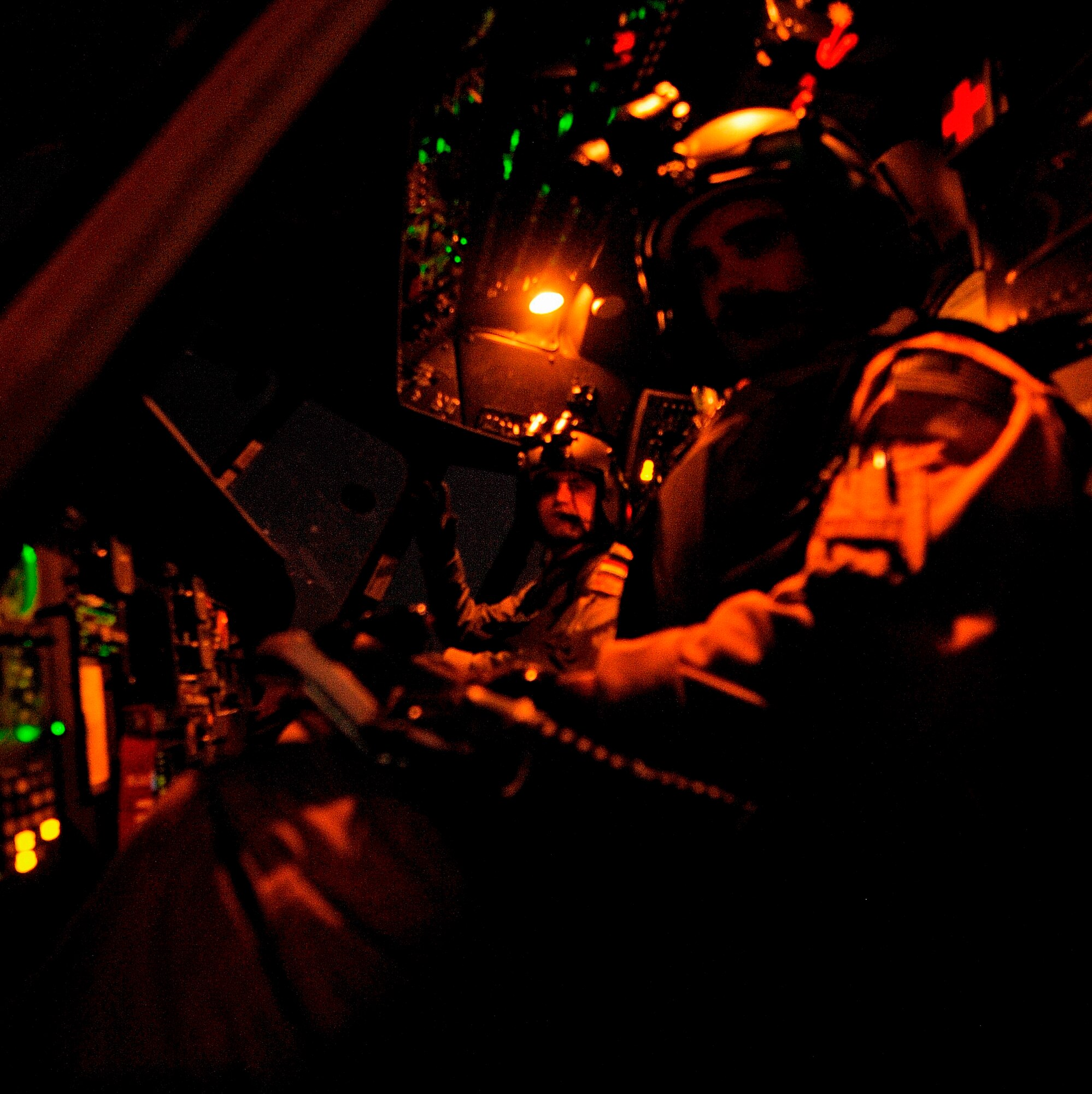 CAMP TAJI, Iraq -- Maj. Eric Vanley, 721st Air Expeditionary Advisory Squadron helicopter instructor pilot, prepares to take off on a night vision google training mission with his Iraqi Army Aviation Command co-pilot March 1. The major is deployed from Kirtland Air Force Base, N.M. and calls El Paso, Texas, home.  (U.S. Air Force/Tech. Sgt. Jason Lake)