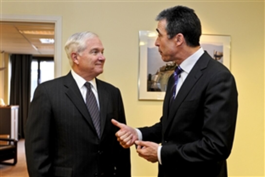 U.S. Defense Secretary Robert M. Gates, left, meets with NATO Secretary General Anders Fogh Rasmussen at NATO headquarters in Brussels, Belgium, March 10, 2011. Gates is in Belgium to attend NATO defense ministers meetings.