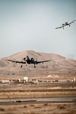NELLIS AIR FORCE BASE, Nev., --  A-10 Thunderbolt II aircraft from the 107th Fighter Squadron, Selfridge  Air National Guard Base Mich., come in for a landing at Nellis Air Force Base, Nev., after completing a training mission during Red Flag 11-3 March 10. Red Flag is a realistic combat training exercise involving the air forces of the United States and its allies. The exercise takes place north of Las Vegas on the Nevada Test and Training Range--the U.S. Air Force's premier military training area with more than 12,000 square miles of airspace and 2.9 million acres of land. (U.S. Air Force photo by Tech. Sgt. Michael R. Holzworth)