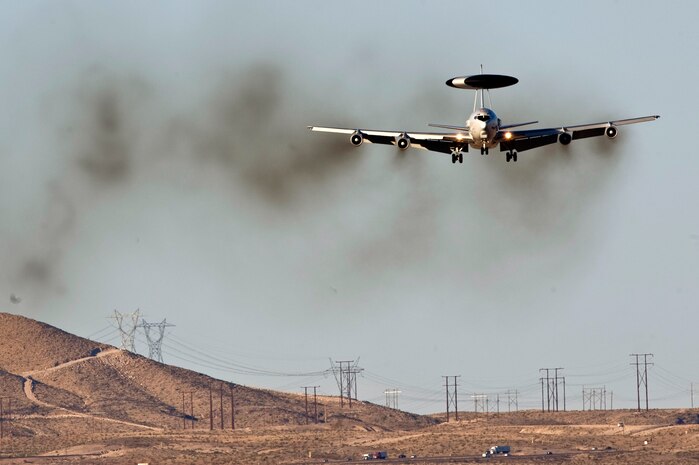 NELLIS AIR FORCE BASE, Nev., --  E-3 Airborne Warning and Control System aircraft, 965th Airborne Air Control Squadron, Tinker Air Force Base, Okla., returns from a training mission over the Nevada Test and Training Range during Red Flag 11-3 at Nellis Air Force Base, Nev., March 10. Red Flag is a realistic combat training exercise involving the air forces of the United States and its allies.  The exercise is hosted north of Las Vegas on the Nevada Test and Training Range. (U.S. Air Force photo by Senior Airman Brett Clashman)