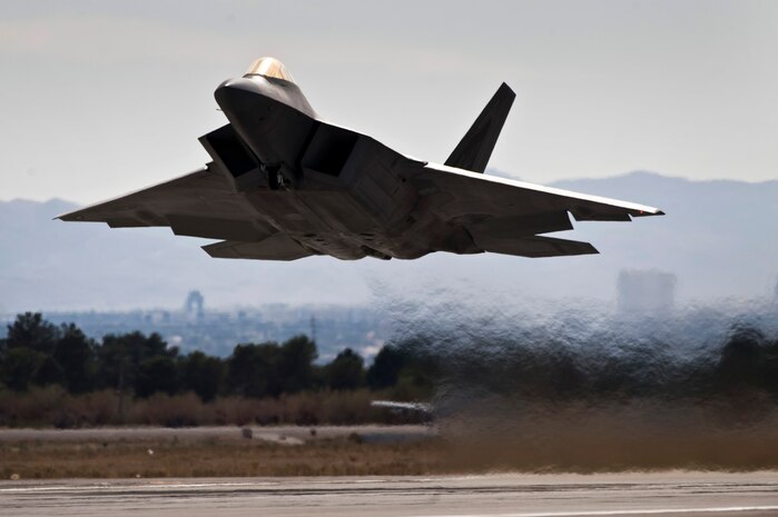 NELLIS AIR FORCE BASE, Nev., --  F-22 Raptor, 3rd Fighter Wing, Elmendorf Air Force Base, Alaska, departs for a training mission over the Nevada Test and Training Range during Red Flag 11-3 at Nellis Air Force Base, Nev., March 10. Red Flag is a realistic combat training exercise involving the air forces of the United States and its allies.  The exercise is hosted north of Las Vegas on the Nevada Test and Training Range. (U.S. Air Force photo by Senior Airman Brett Clashman)