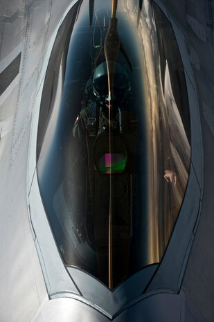NEVADA TEST AND TRAINING RANGE --  F-22 Raptor, 49th Fighter Wing, Holloman Air Force Base, N.M., pulls up for air refueling over the Nevada Test and Training Range during Red Flag 11-3, March 3. Red Flag is a realistic combat training exercise involving the air forces of the United States and its allies. The exercise is hosted north of Las Vegas on the Nevada Test and Training Range.(U.S. Air Force photo by Senior Airman Brett Clashman)
