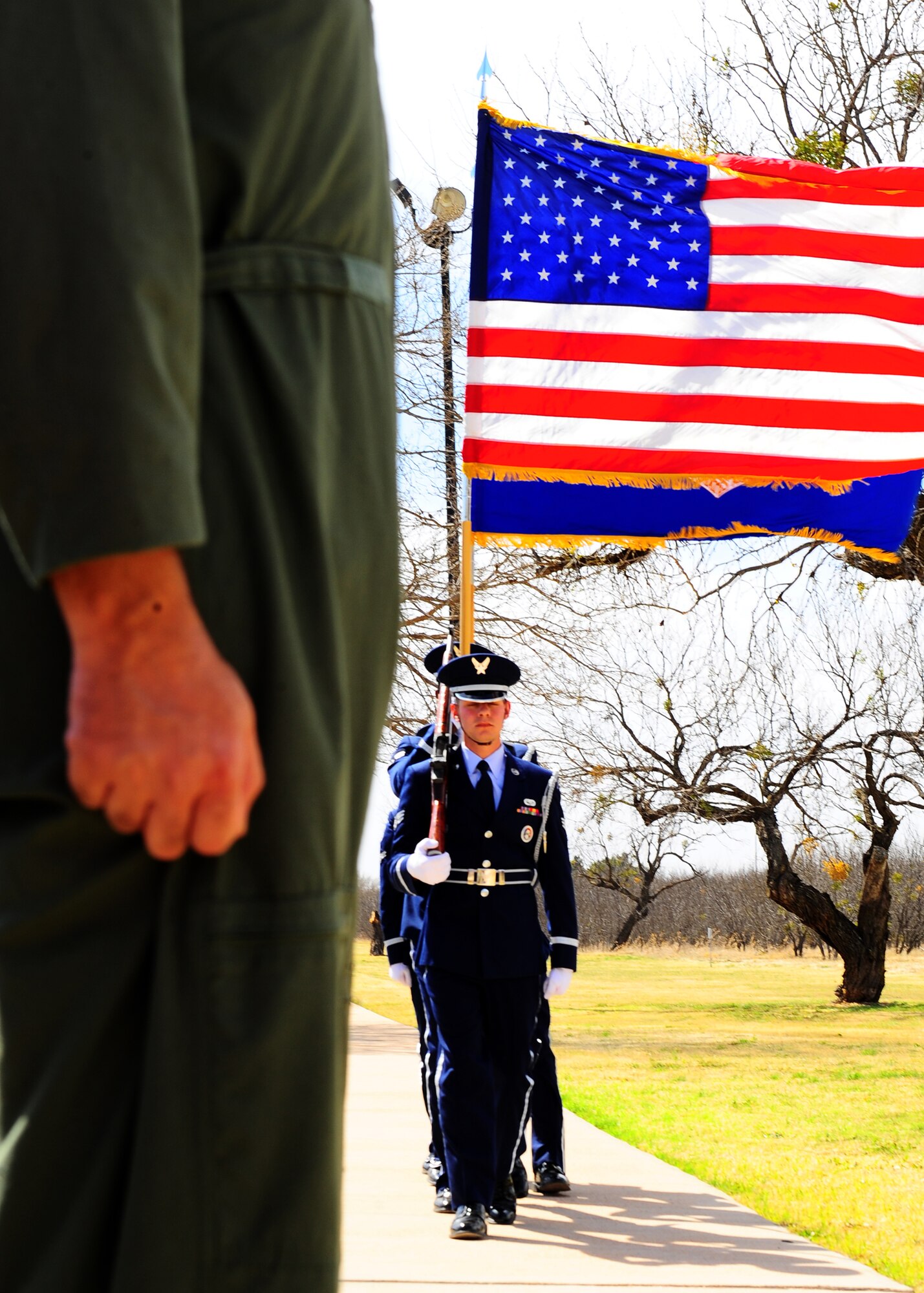 DYESS AIR FORCE BASE, Texas – Dyess Air Force Base Honor Guard members present the colors March 11 during a Medal of Honor ceremony here honoring Chief Master Sgt. Richard Loy Etchberg. Chief Etchberg was a Senior NCO in the U.S. Air Force who posthumously received the military’s highest decoration, the Medal of Honor, for his actions during the Battle of Lima Site 85 in the Vietnam War. The medal was formally presented to his three sons by President Barack Obama during a ceremony at the White House on Sept. 21, 2010. (U.S. Air Force photo/ Airman 1st Class Courtney Moses)