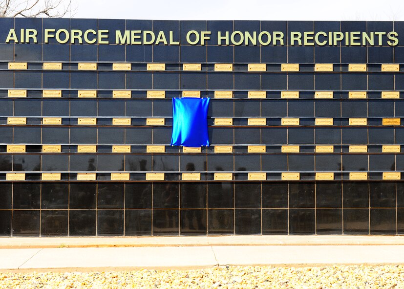 DYESS AIR FORCE BASE, Texas – Chief Master Sgt. Richard Loy Etchberg’s plaque sits covered on the Dyess Air Force Base Medal of Honor Memorial March 11 during a Medal of Honor ceremony here. Chief Etchberg was a Senior NCO in the U.S. Air Force who posthumously received the military’s highest decoration, the Medal of Honor, for his actions during the Battle of Lima Site 85 in the Vietnam War. The medal was formally presented to his three sons by President Barack Obama during a ceremony at the White House on Sept. 21, 2010. (U.S. Air Force photo/ Airman 1st Class Courtney Moses)