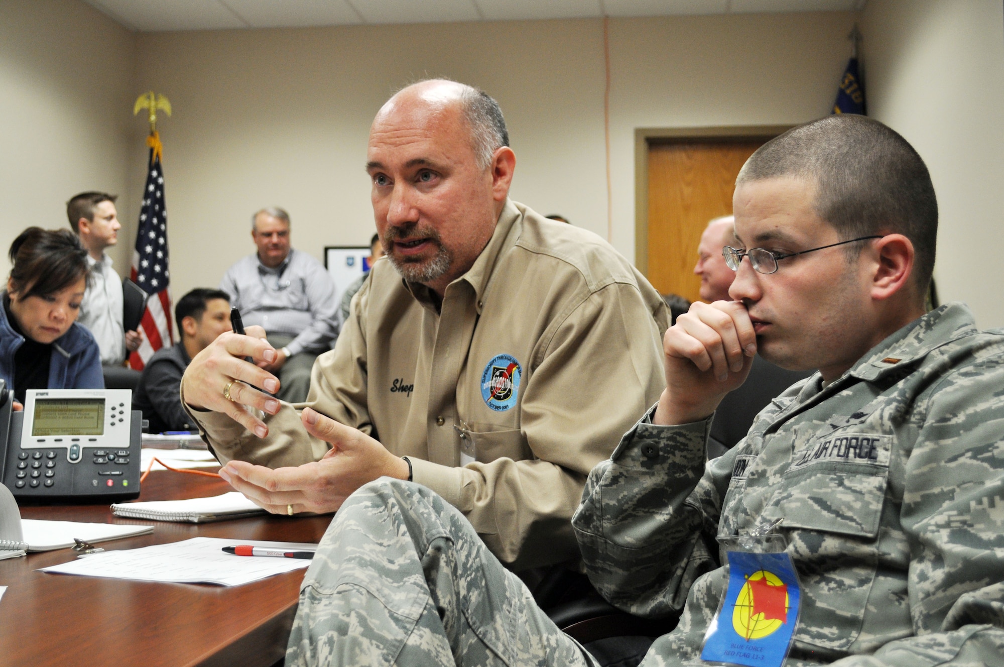 James Hird, 90th Information Operations Squadron Cyber Integration Flight chief, speaks during the blue team debrief after Red Flag operations March 7. Air Force Space Command elements, including cyber, took part in blue team operations for the first time in Red Flag history Feb. 21 through March 11. (Air Force photo by Tech. Sgt. Scott McNabb)