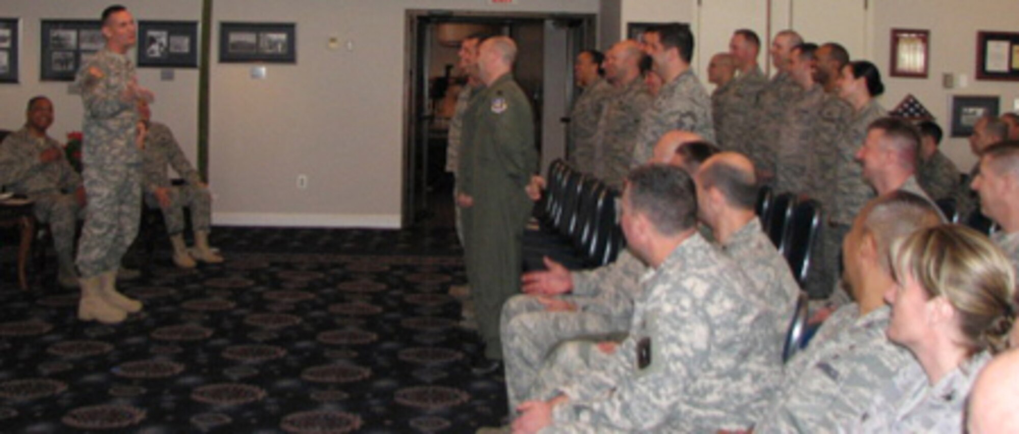 Maj. Gen. Patrick A. Murphy, New York's Adjutant General, speaks with Airmen from the Joint Air Defense Operations Center on Tuesday, March 8. The JADOC Airmen were sworn into the NY Air National Guard as part of an assumption of command held at the Joint Base Anacostia Bolling Club. 