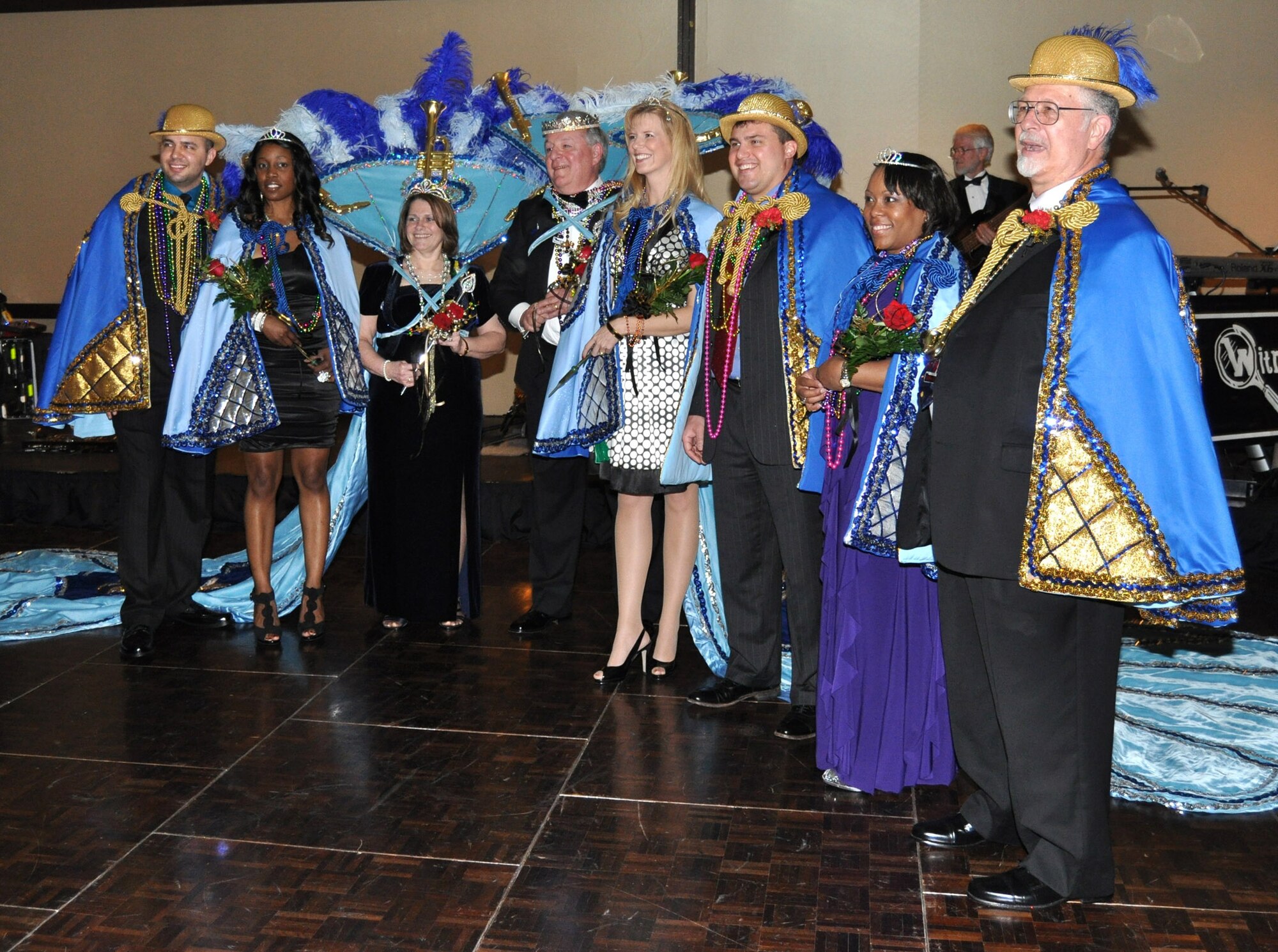 From left, court members for the 23rd annual Krewe of Medics Mardi Gras Ball are Wesley St. Clair, 81st Medical Support Squadron; Tyreema Anderson, 81st Surgical Operations Squadron; Queen Brenda Thomas, 81st MSGS; King Tom Mattingly, Humana Military Healthcare; Krista Hutchinson and Scott Eisenhuth, 81st MSGS; and Carla Leeseberg and Steve Pivnick, 81st Medical Group. The theme for this year’s event held Feb. 26 at the IP Casino Resort and Spa was “New Orleans Jazz and Blues.”  (Photo by Dawn Hitchings)