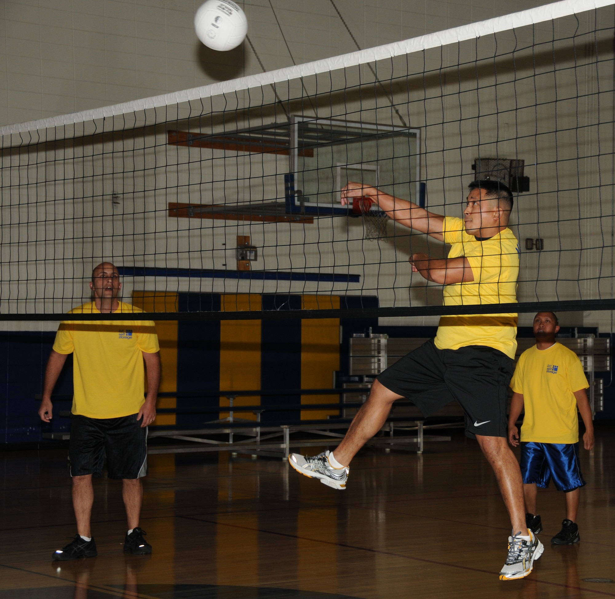 Jerry Dameron, 81st MDOS, gets a hard hit over the net  March 3 in a game against the 81st Security Forces Squadron.  The medics beat the cops, 2-0.  (U.S. Air Force photos by Kemberly Groue)