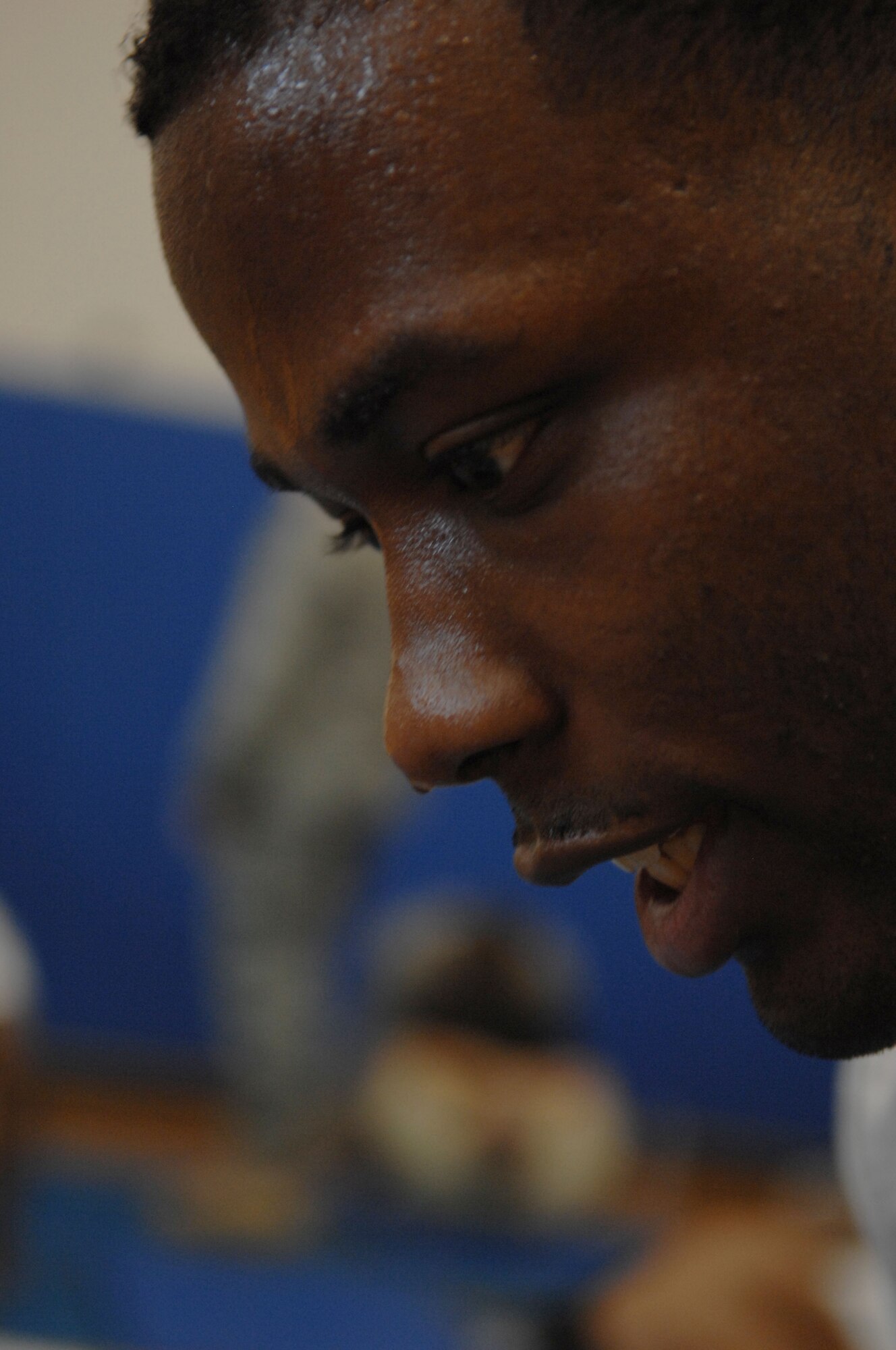 Airman 1st Class Derek Guess, 633d Aerospace Medicine Squadron public health technician, participates in the Push-up-A-Thon/Sit-up-A-Thon at the Shellbank Fitness Center, Langley Air Force Base, Va., March 11, 2011. This event enabled the Langley first sergeants to donate approximately $1,200  to the Enlisted Heritage Hall museum. (U.S. Air Force photo by Airman 1st Class Racheal Watson/Released)
