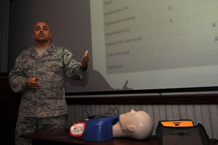 3/9/2011 - NELLIS AIR FORCE BASE, Nev. -- Tech. Sgt. DeAndre Scott, co-chair of the Public Access Defibrillation program, explains the benefits of having an Automated External Defibrillator available in all work centers in case of a life threatening emergency during the 99th Air Base Wing weekly staff meeting March 9.  The PAD program members are trying to raise awareness about the AED device and can assist units in obtaining the device.  For more information, contact DeAndre.Scott@nellis.af.mil or Cheryl.Hulsman@nellis.af.mil. (U.S. Air Force photo by Staff Sgt. Taylor Worley)