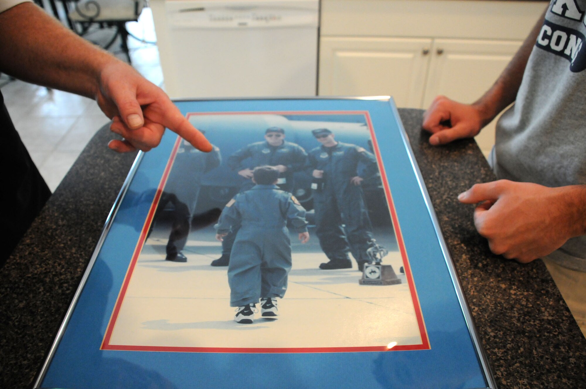 Trinity, Fla. -- From a young age, Kevin Porath knew he wanted to be a pilot.  His father found a flight suit for him to wear during an air show when Kevin was 4.  Now 17, Kevin remembers giving tours of the aircraft during the event. (Photo courtesy of the Porath family.)