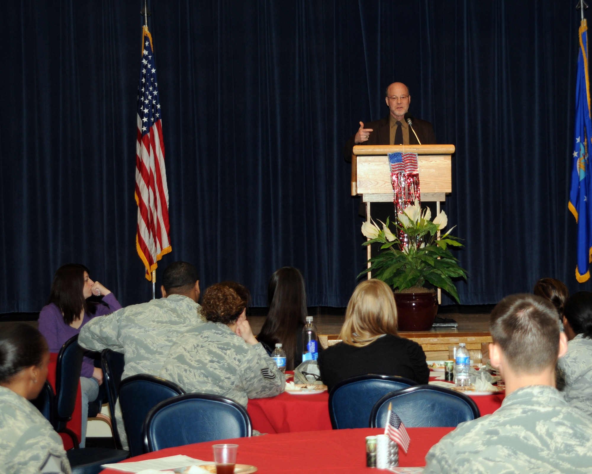 ALTUS AIR FORCE BASE, Okla. -- Dr. Edward Tick, Soldier's heart director and author of "War and the Soul: Healing Our Nation's Veterans from Post Traumatic Stress Disorder", gave a presentation at the Freedom Community Center here Mar. 10. Dr. Tick spoke about helping those with Post-traumatic Stress Disorder and that there is hope for healing. The luncheon was sponsored by the Armed Services YMCA here.  (U.S. Air Force photo by Airman 1st Class Kenneth W. Norman/ Released 97th Air Mobility Wing Public Affairs.)