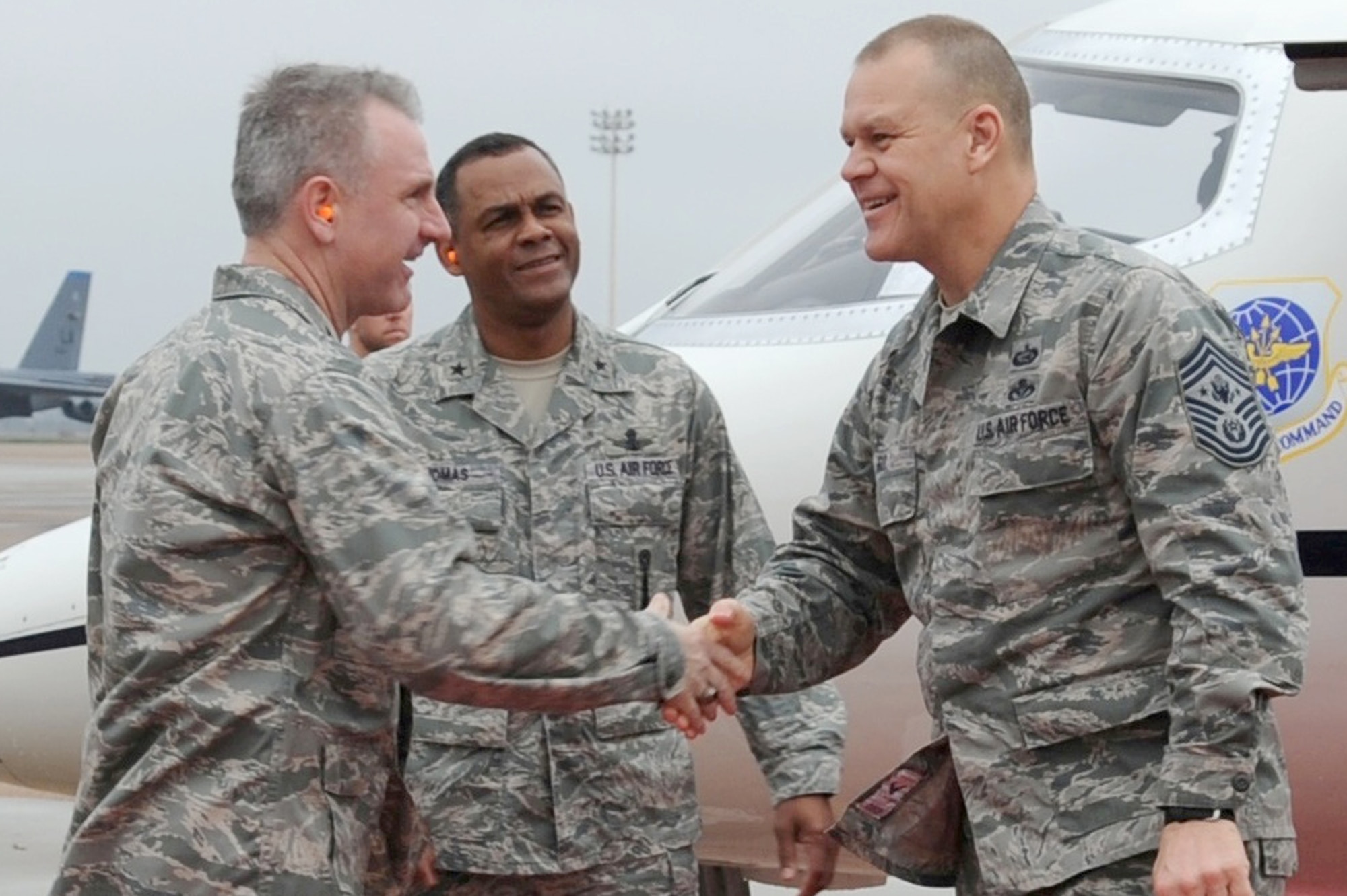 Col. Tim Fay with Brig. Gen. Everett Thomas greets Chief Master Sgt. of the Air Force James A. Roy upon his arrival to Barksdale Air Force Base, La., March 8, 2011. Colonel Fay is the the 2nd Bomb Wing commander. General Thomas is the Air Force Global Strike Command vice commander. (U.S. Air Force photo/Senior Airman Alexandra M. Boutte)