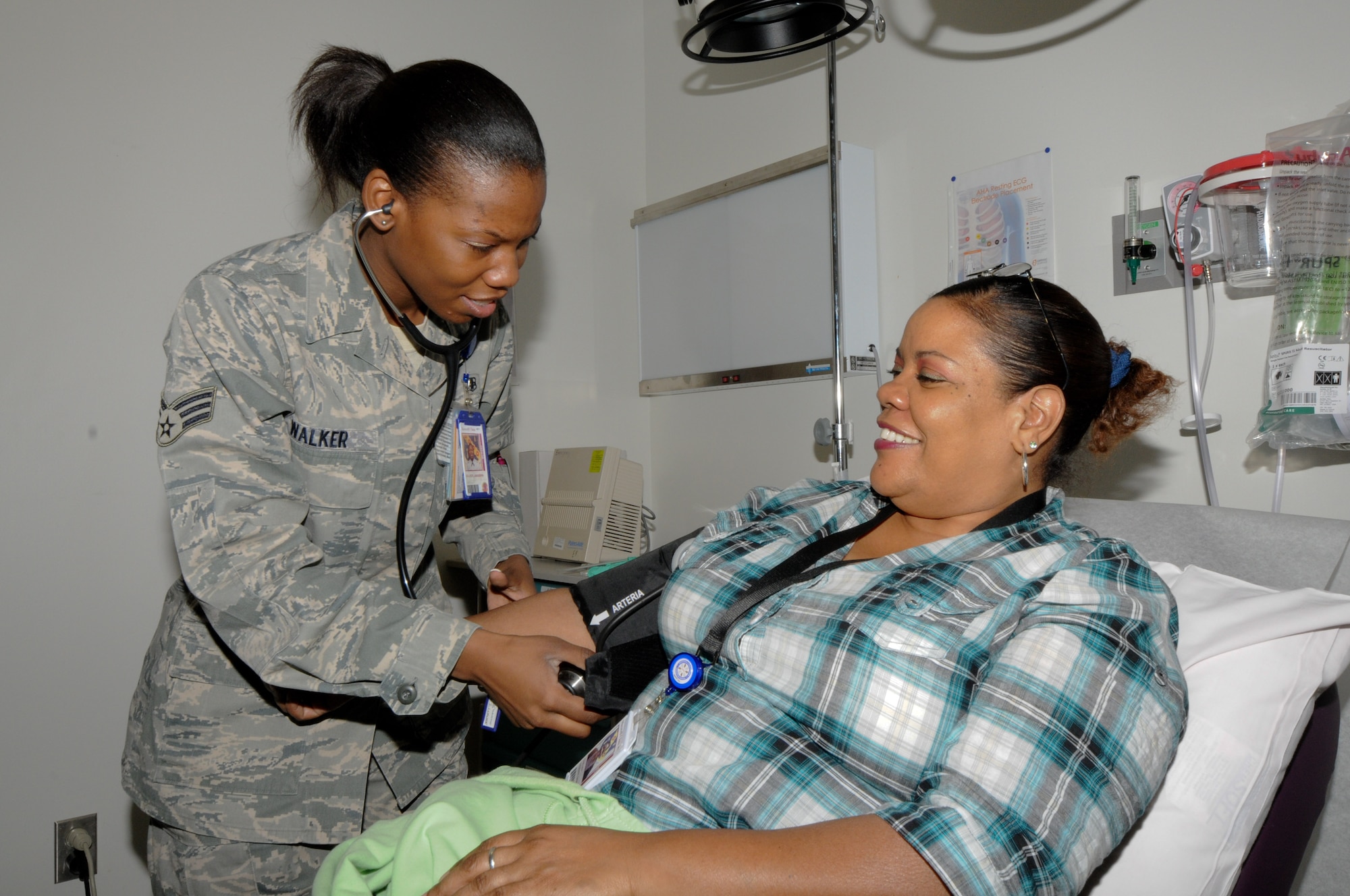 Senior Airman Jakasha Walker of the 42nd Medical Group practices her screening techniques at the clinic. Upcoming initiatives at the medical group will hone in on continuity of care. (Air Force photo/Wendy Simonds)
