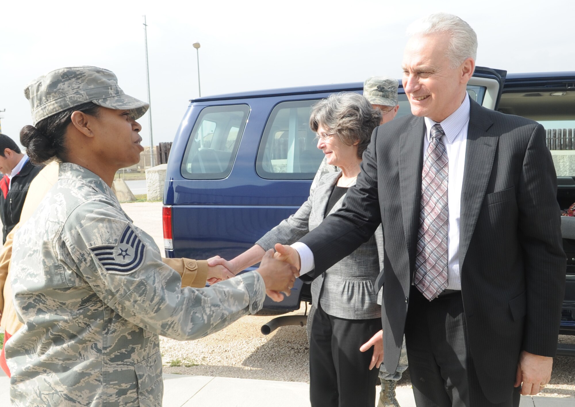 Tech. Sgt. Kim Wakefield from the 39th Force Support Squadron greets the U.S. ambassador to Turkey, Francis J. Ricciardone Jr., during his visit to Incirlik Air Base, Turkey, Feb. 24, 2011. During the visit, the ambassador and his wife, Dr. Marie Ricciardone, received a base tour and had office calls with the 10th Tanker Command commander and 39th Air Base Wing leadership. Also pictured is Dr. Marie Ricciardone. (U.S. Air Force photo by Tech. Sgt. Valda Wilson/Released)