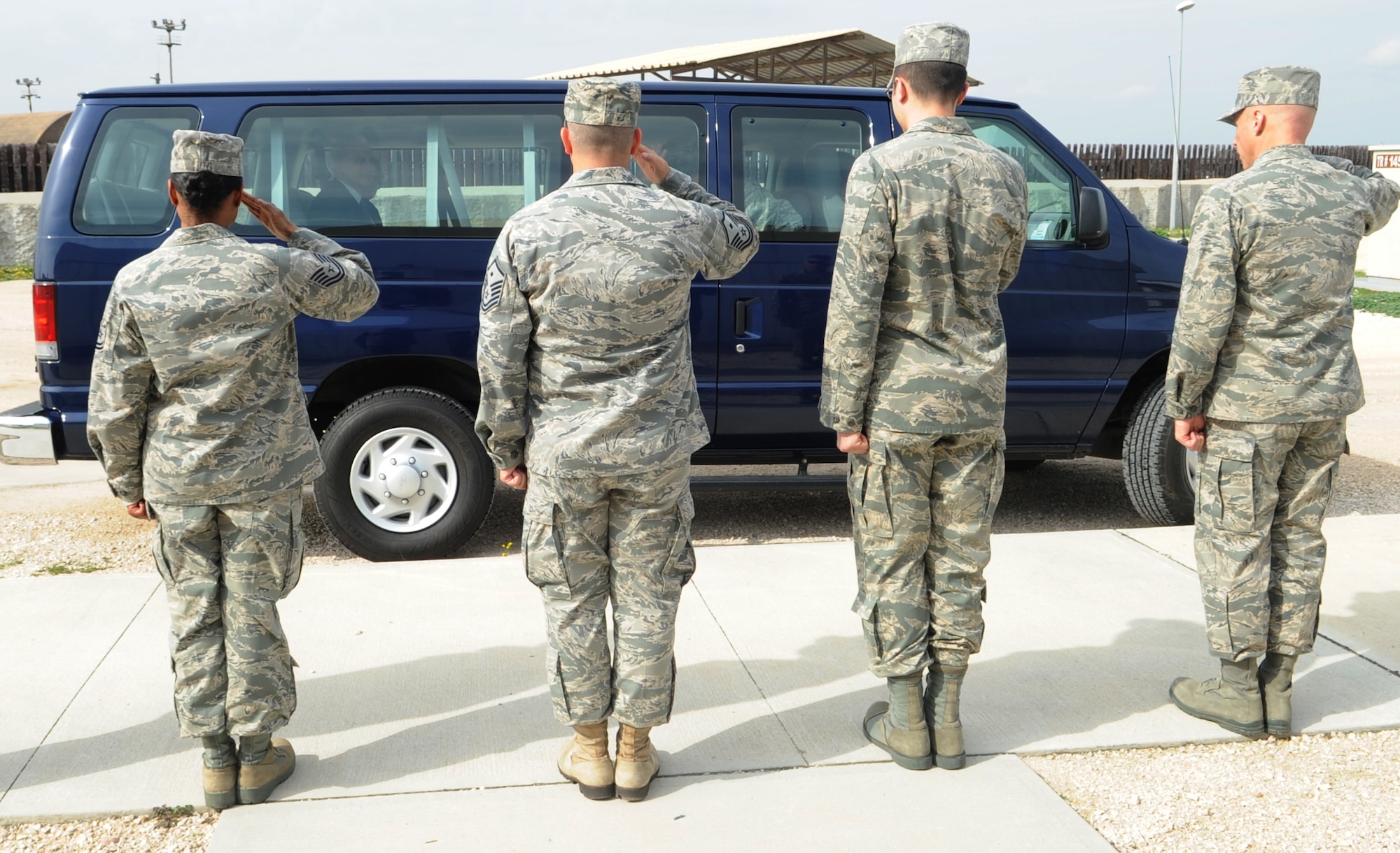 Tech. Sgt. Kim Wakefield, from the 39th Force Support Squadron, Master Sgt. Bill Barry, the 39th FSS 1st Sergeant, 1st Lt. Jonathan Murphy, from the 39th Air Base Wing protocol office, and Maj. Thomas Ausherman, the 39th FSS commander salute the arrival of Ambassador Francis J. Ricciardone Jr. to Incirlik Air Base, Turkey Feb. 24, 2011. The ambassador and his wife, Dr. Marie Ricciardone, received a base tour and had office calls with the 10th Tanker Command commander and 39th Air Base Wing leadership. (U.S. Air Force photo by Tech. Sgt. Valda Wilson/Released)