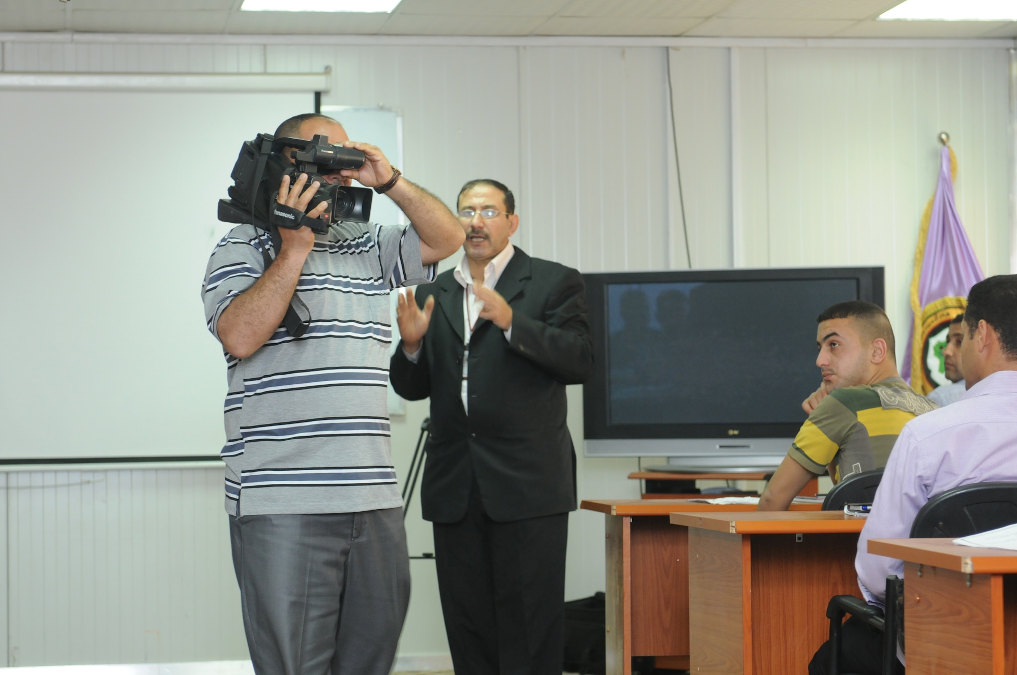 BAGHDAD - Qais Subhie Mustafa, who works for the Chief of Staff of the Department of Media and relations and is the Instructor for the Iraqi Ministry of Defense’s Advanced Broadcasting and Television Production Workshop, teaches the class the different aspects of using a video camera at the MoD’s Ministerial Developmental and Training Center here Feb. 28. The first advanced iteration of the workshop graduated March 2. (U.S. Army photo/Spc. Breeanna DuBuke)