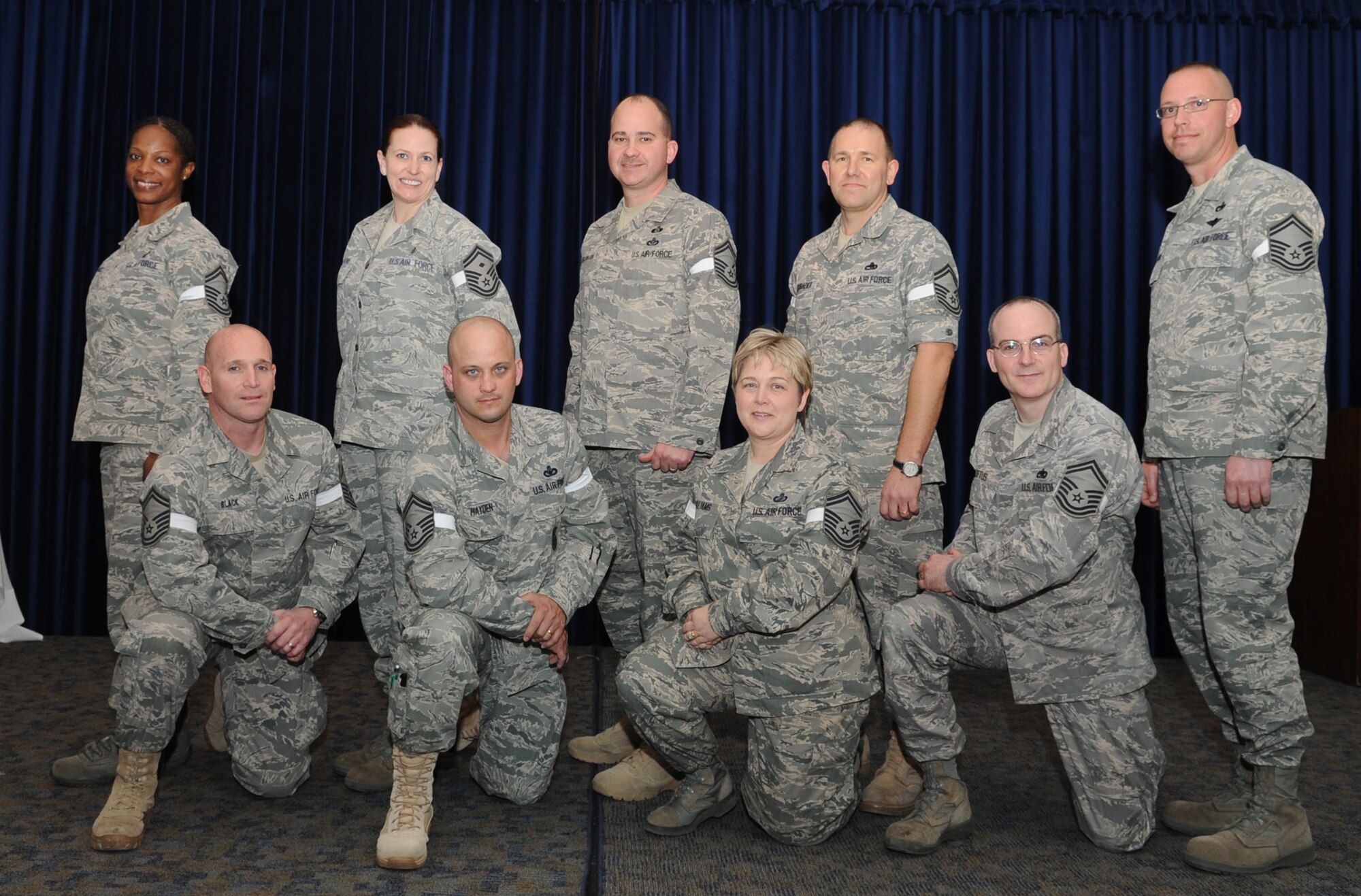 The Team Incirlik Airmen selected for promotion to senior master sergeant pose for a photo March 11, 2011, at Incirlik Air Base, Turkey. From left to right: Master Sgts. Ouida Daniels, James Black, Tanya Carbone, Chadrick Hayden, Gregory Brannan, Mandy Williams, Robert Schrader, Eric Loftus. Not pictured: Master Sgts. Blenda Mease, Craig Moir, Michael Laskowski, Jennifer Anthony, Kenneth Patterson, and William Walden. (U.S. Air Force photo by Airman 1st Class Clayton Lenhardt/Released)