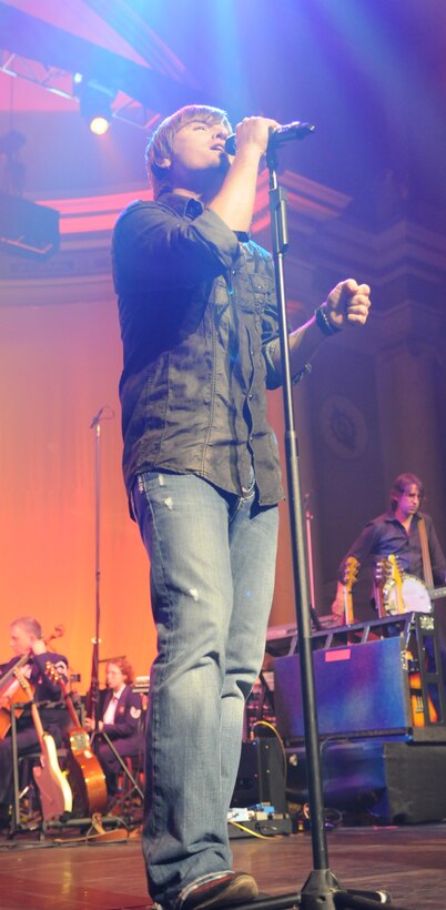 Mr. Cody Collins, lead vocalist for country rock group Lonestar, sings their hit single “I’m already there” March 6 at the Daughters of the American Revolution Constitution Hall, Washington, D.C. Lonestar dedicates “I’m already there” to the men and women serving in the U.S. military. (U.S. Air Force photo by Senior Airman Christopher Ruano)