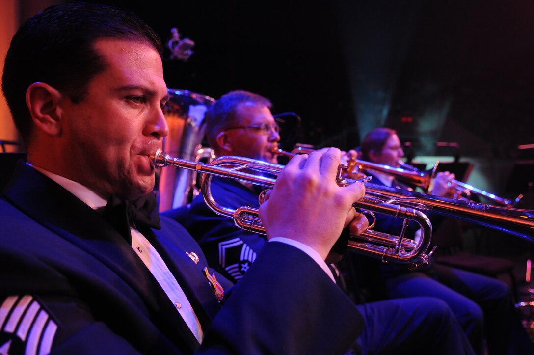 Tech. Sgt. Christian Pagnard, member of The U.S. Air Force Band, plays the trumpet March 6 at the Daughters of the American Revolution Constitution Hall, Washington, D.C. Musicians from The USAF Band's Max Impact, Airmen of Note, The Singing Sergeants and The Air Force Strings ensembles contribute to the 2011 Guest Artist Series. (U.S. Air Force photo by Senior Airman Christopher Ruano) 