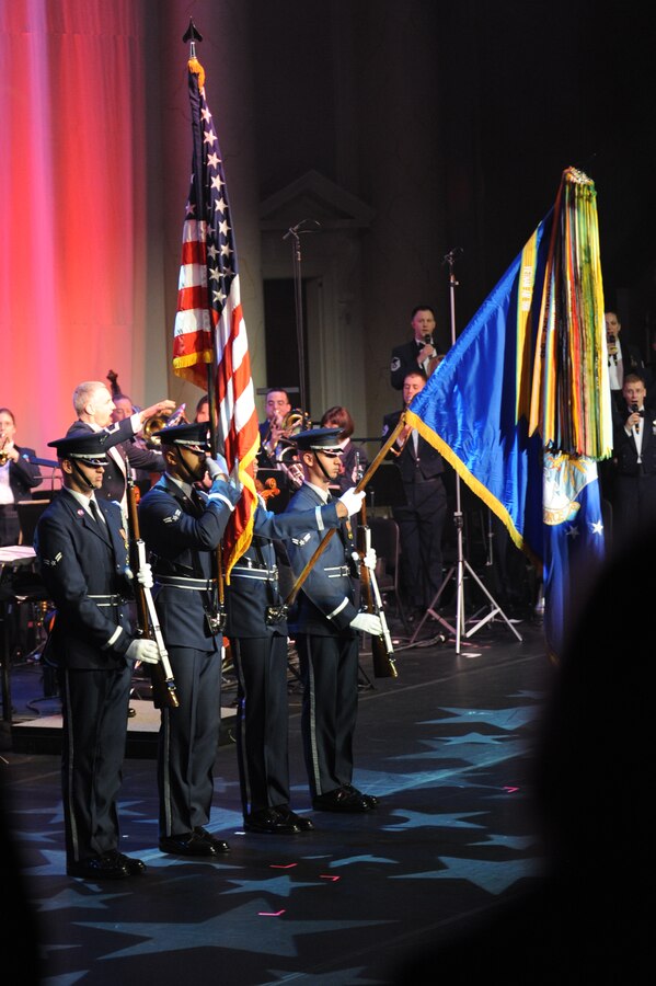 Members of The U.S. Air Force Honor Guard colors team present the colors during The U.S. Air Force Band's 2011 Guest Artist Series performance March 6 at the Daughters of the American Revolution Constitution Hall, Washington, D.C. The USAF Honor Guard is invited to present the nations colors before each band performance. (U.S. Air Force photo by Senior Airman Christopher Ruano)