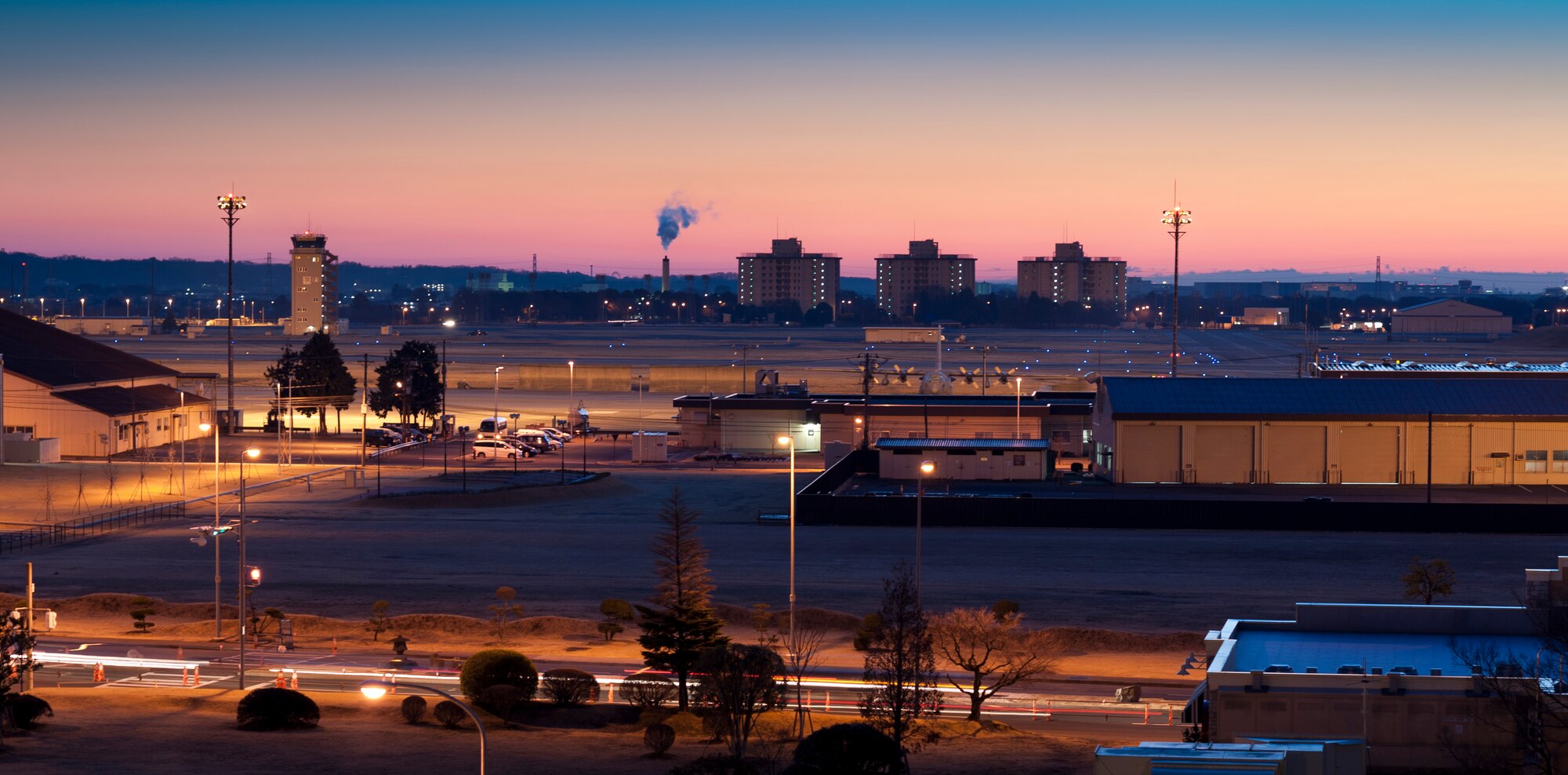 YOKOTA AIR BASE, Japan -- A view of the sunrise for Yokota residents during the early morning hours on the final day of an Operational Readiness Exercise here March 11. During the week-long exercise, participants practiced contingency operations to prepare them should they be called to support operations in a wartime environment. (U.S. Air Force photo/Staff Sgt. Samuel Morse)