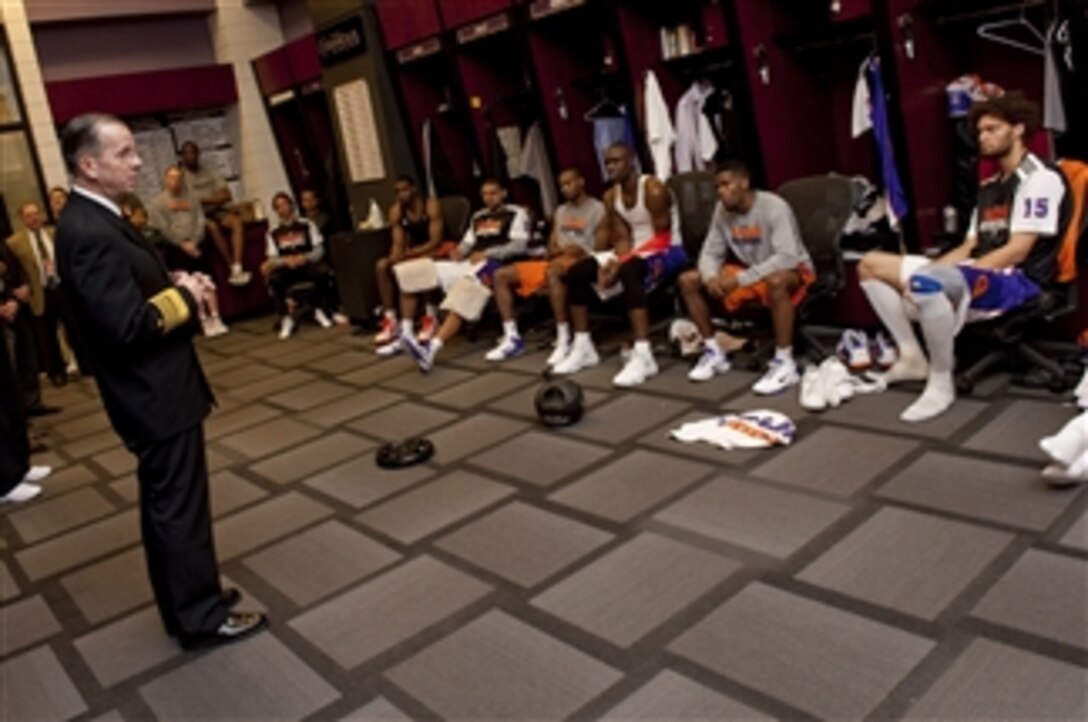 Chairman of the Joint Chiefs of Staff Adm. Mike Mullen, U.S. Navy, speaks with members of the Phoenix Suns basketball team at Sun Stadium in Phoenix, Ariz., on March 10, 2010.  Mullen visited Phoenix to speak with Arizona local and state officials in his continuing Conversations with the Country tour.  