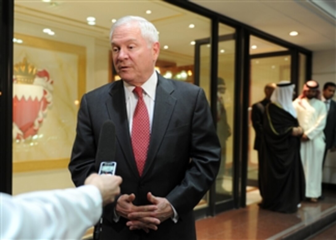 Secretary of Defense Robert M. Gates makes a brief statement about the tragic earthquake and tsunami in Japan after his arrival in Bahrain on March 11, 2003.  