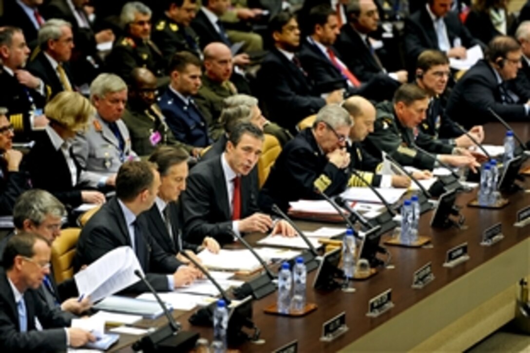 NATO Secretary General Anders Fogh Rasmussen opens the meeting of NATO defense ministers with non-NATO International Security Assistance Force contributing nations at NATO headquarters in Brussels, Belgium, March 11, 2011.