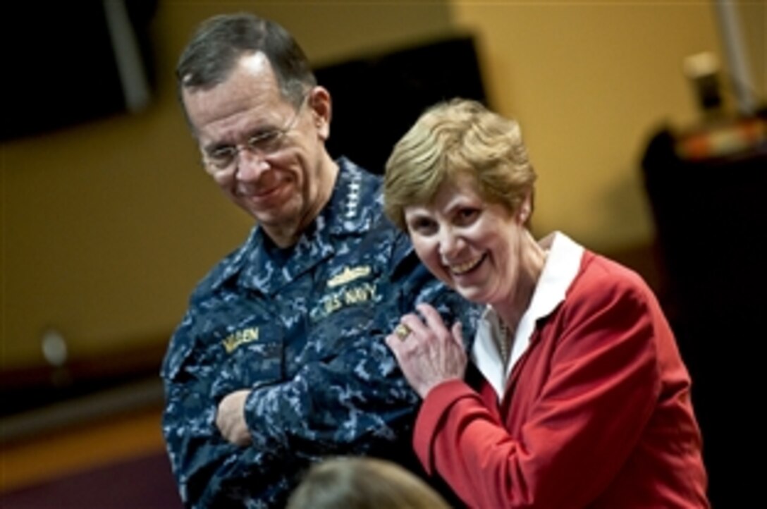 Navy Adm. Mike Mullen, chairman of the Joint Chiefs of Staff, and his wife, Deborah, speak with Fort Bliss enlisted spouses in El Paso, Texas, March 10, 2011.