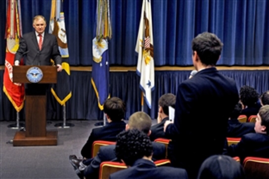 Deputy Defense Secretary William J. Lynn III listens as a participant in the 49th Annual U.S. Senate Youth Program poses a question during the group's visit to the Pentagon, March 11, 2011.